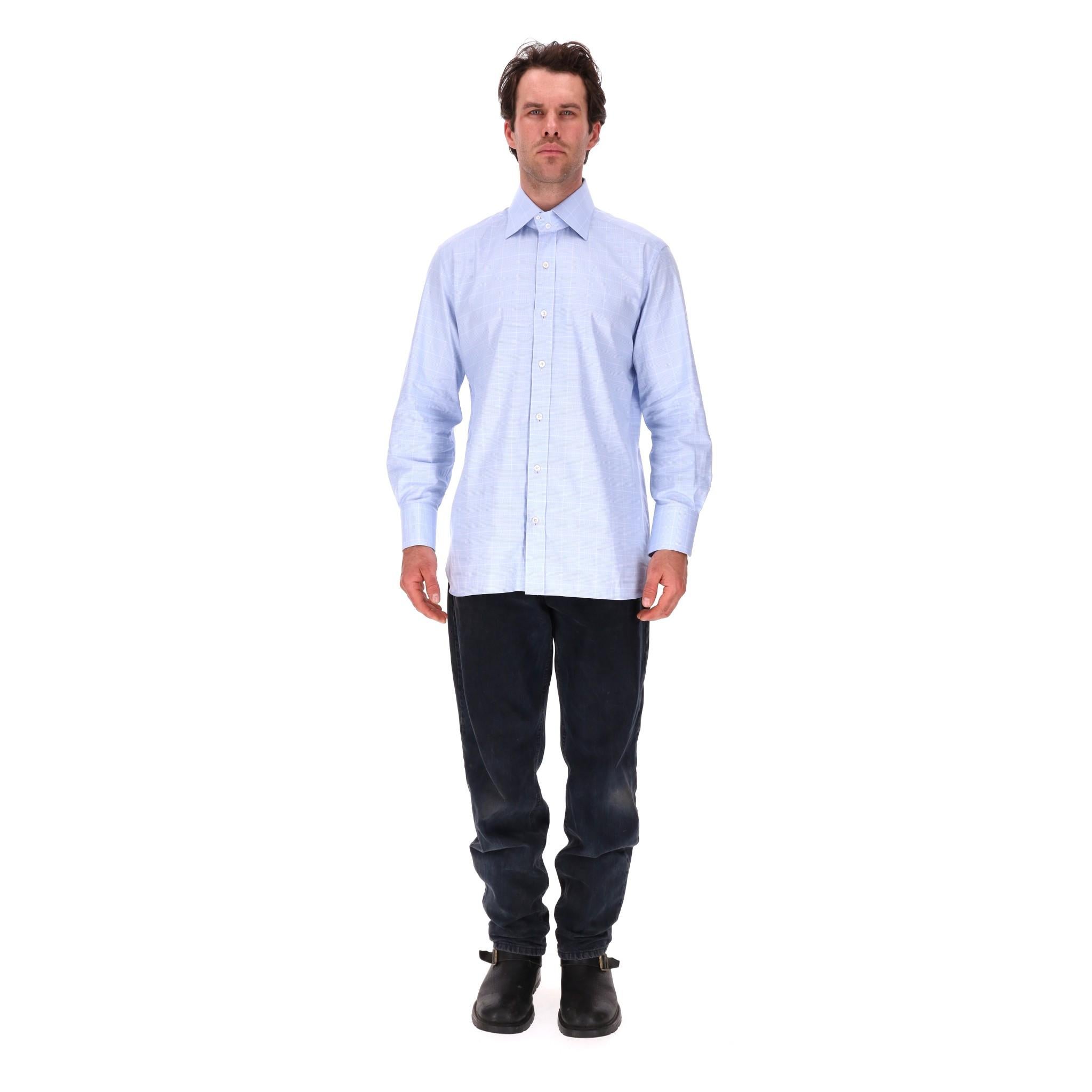 Tom Ford Checked Cotton Shirt

Light blue, classic shirt fully crafted from cotton in checked pattern.

Classic collar, regular fit with centre button fastening and buttoned cuffs.

Rrp £640

Size – 43IT

Condition – Excellent

Composition – 100%