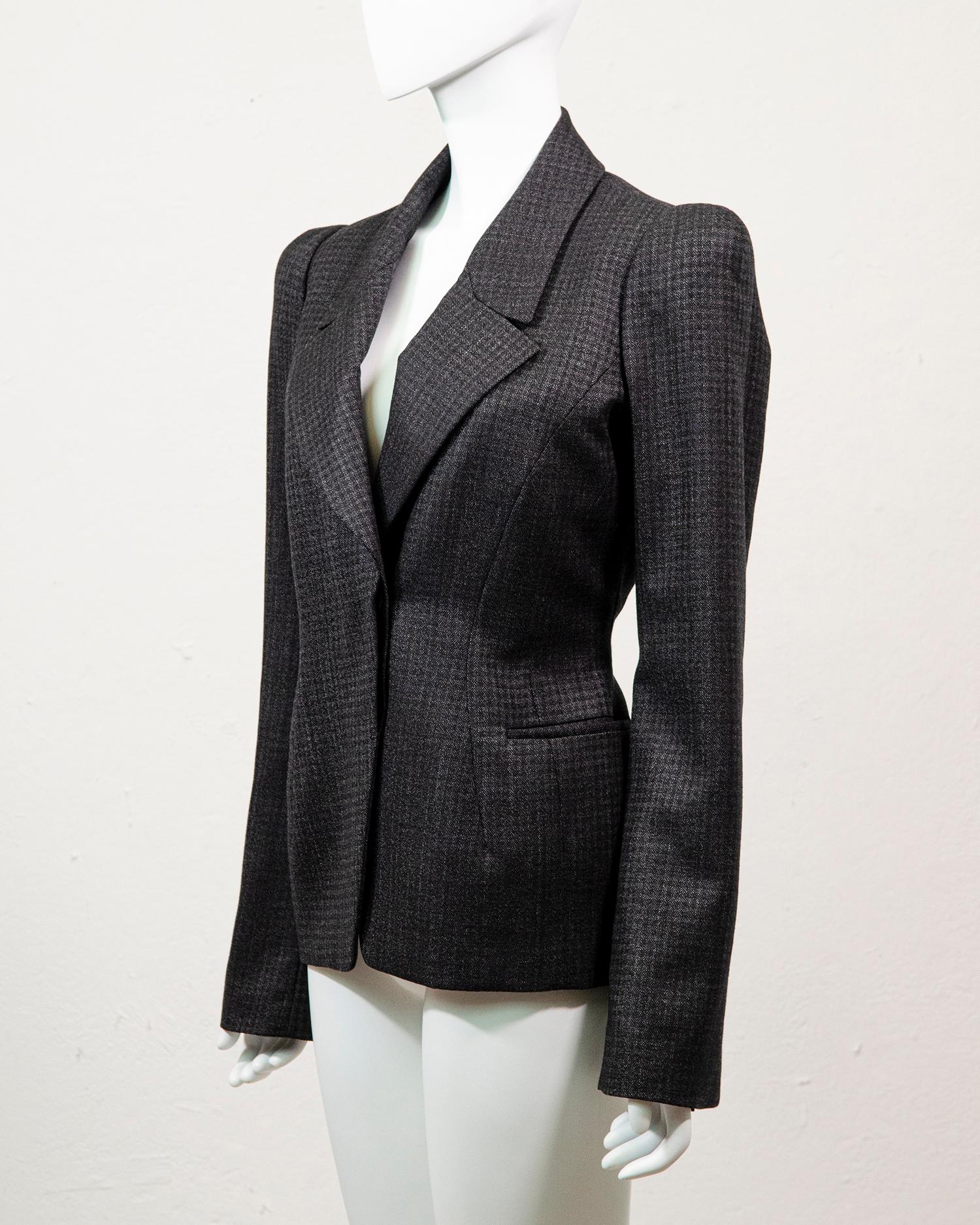 Gorgeous elegant and classic wool blazer by Tom Ford <3

This blazer is tailored to perfection and features large statement shoulders, a deep V neckline and a concealed button closure. Made from a grey checked soft wool it is a perfect wardrobe