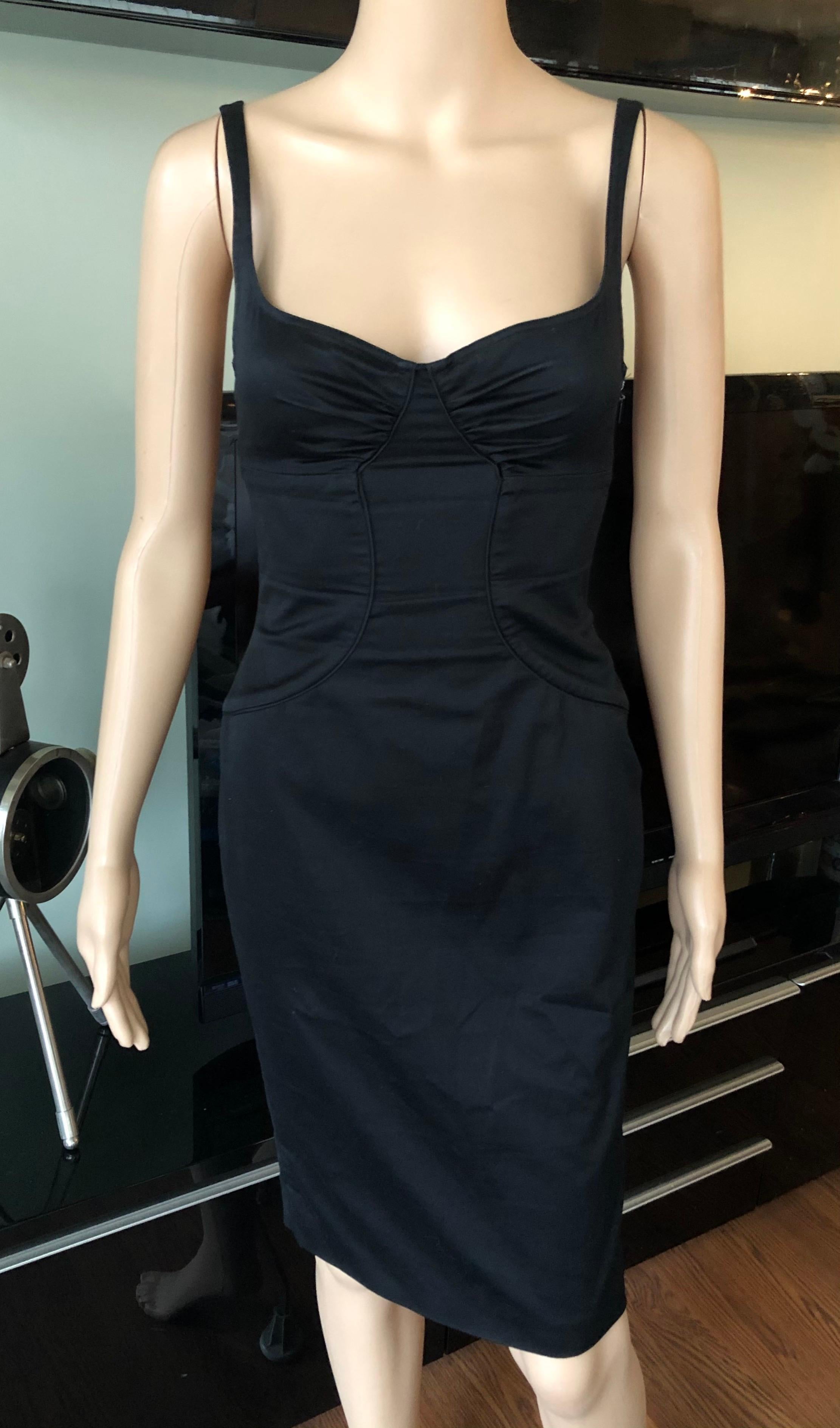Tom Ford for Gucci 2003 Bustier Cutout Back Black Mini Dress IT 38

Gucci black mini dress with bustier neckline, cutout accent at back and concealed zip closure at side. 
