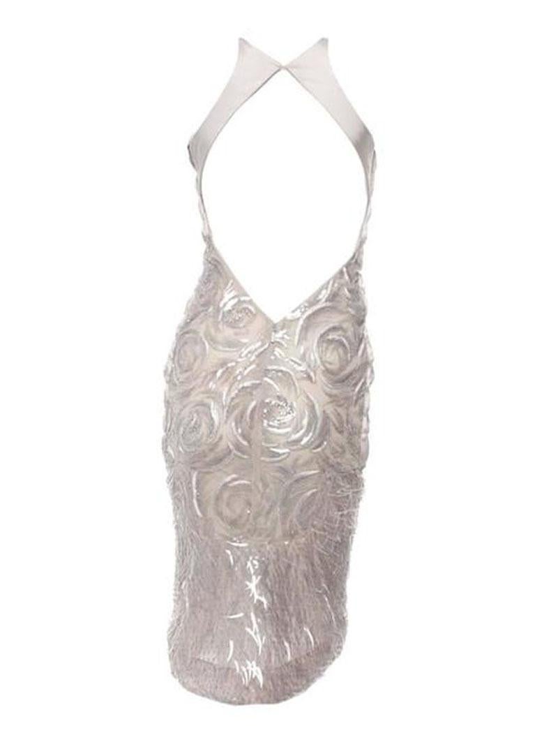 Super Rare Tom Ford for Gucci Incredible Cocktail Dress
A Longer Version of This Dress was Exclusively Made for Nicole Kidman which She Wore to Venice Festival.
2004 Collection
Designer size 38
Dove Gray ( Silver) Color, Embellished and Embroidered