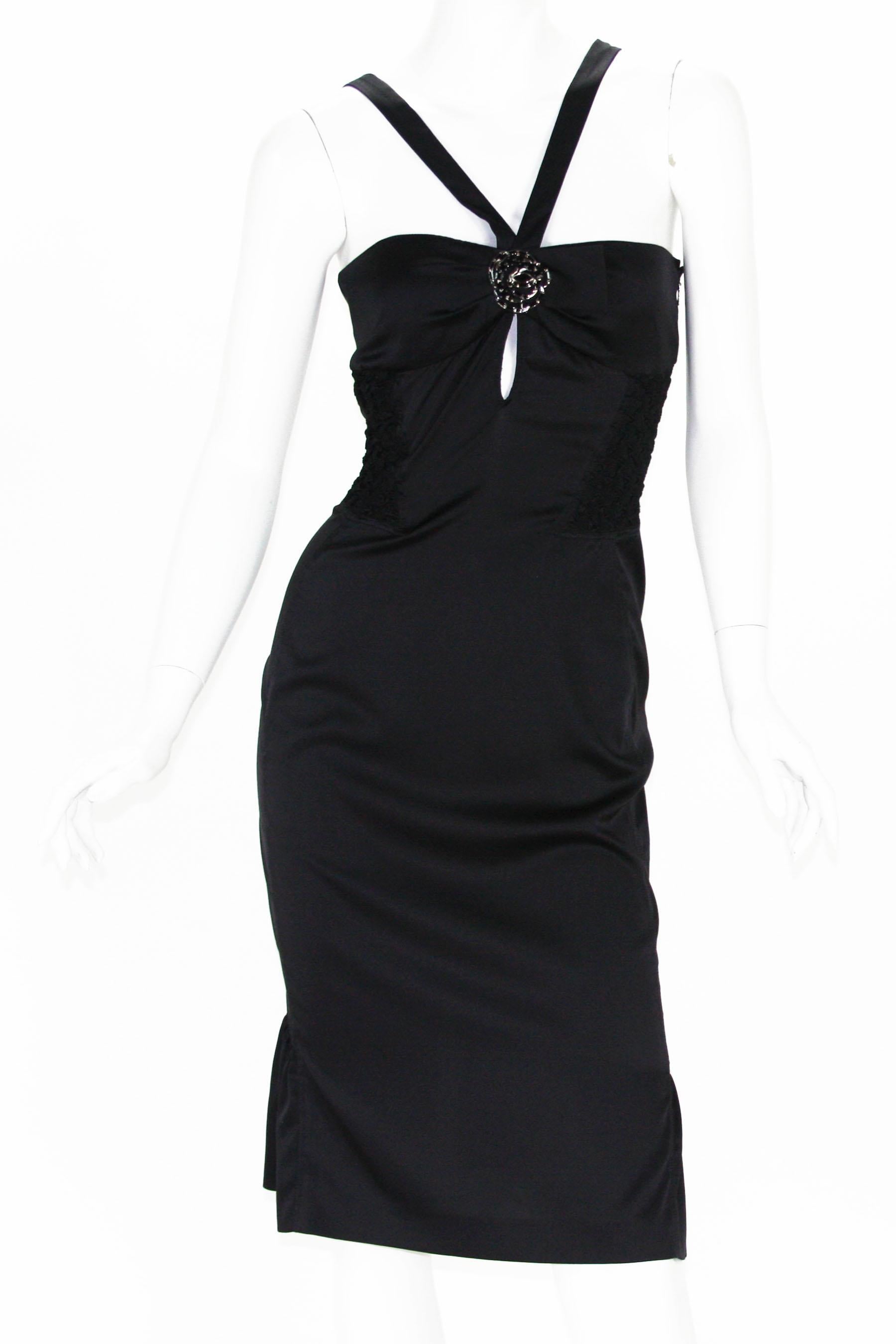 Tom Ford for Gucci Black Silk Stretch Cocktail Dress with Brooch
2004 Collection
Designer size 40 -  US 4
Black Stretch Silk Cocktail Dress, Black Crystals Removable Brooch with Gucci Engraving on Back, Keyhole Detail, Smocked Stretch Panels Insert,