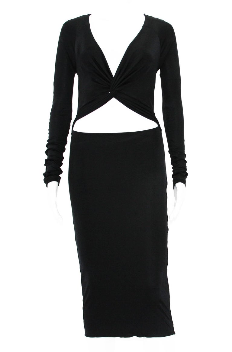Tom Ford for Gucci 90's Sexy Cut Out Cocktail Dress
Designer sizes available - M and L
Black Stretch Jersey, Double Layered Skirt, Simple Slip On.
Made in Italy.
Excellent Condition.