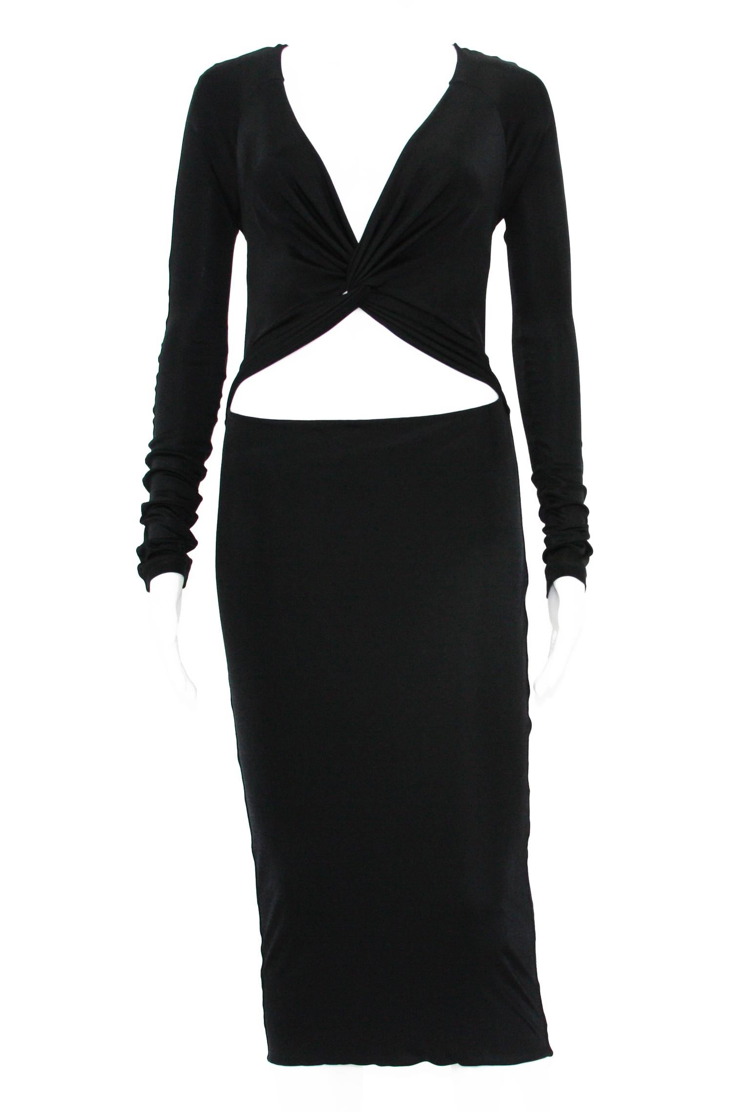 Tom Ford for Gucci 90's Sexy Cut Out Cocktail Dress
Designer size - M 
Black Stretch Jersey, Double Layered Skirt, Simple Slip On.
Made in Italy.
Excellent Condition.