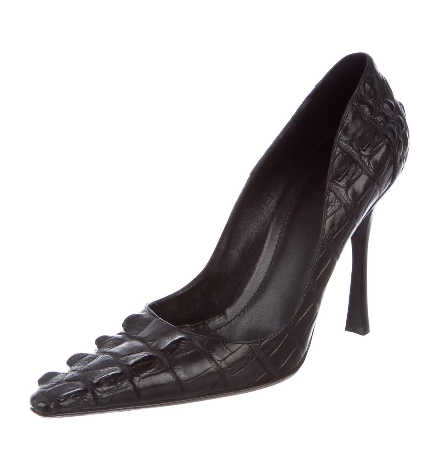 Tom Ford for Gucci Black Crocodile Heels Pumps
Designer size - 9 B
F/W 2002 Collection
Genuine crocodile skin, Leather sole & insole, stacked heels height - 4.5 inches
Made in Italy.
Excellent condition, price sticker still attached to the sole.