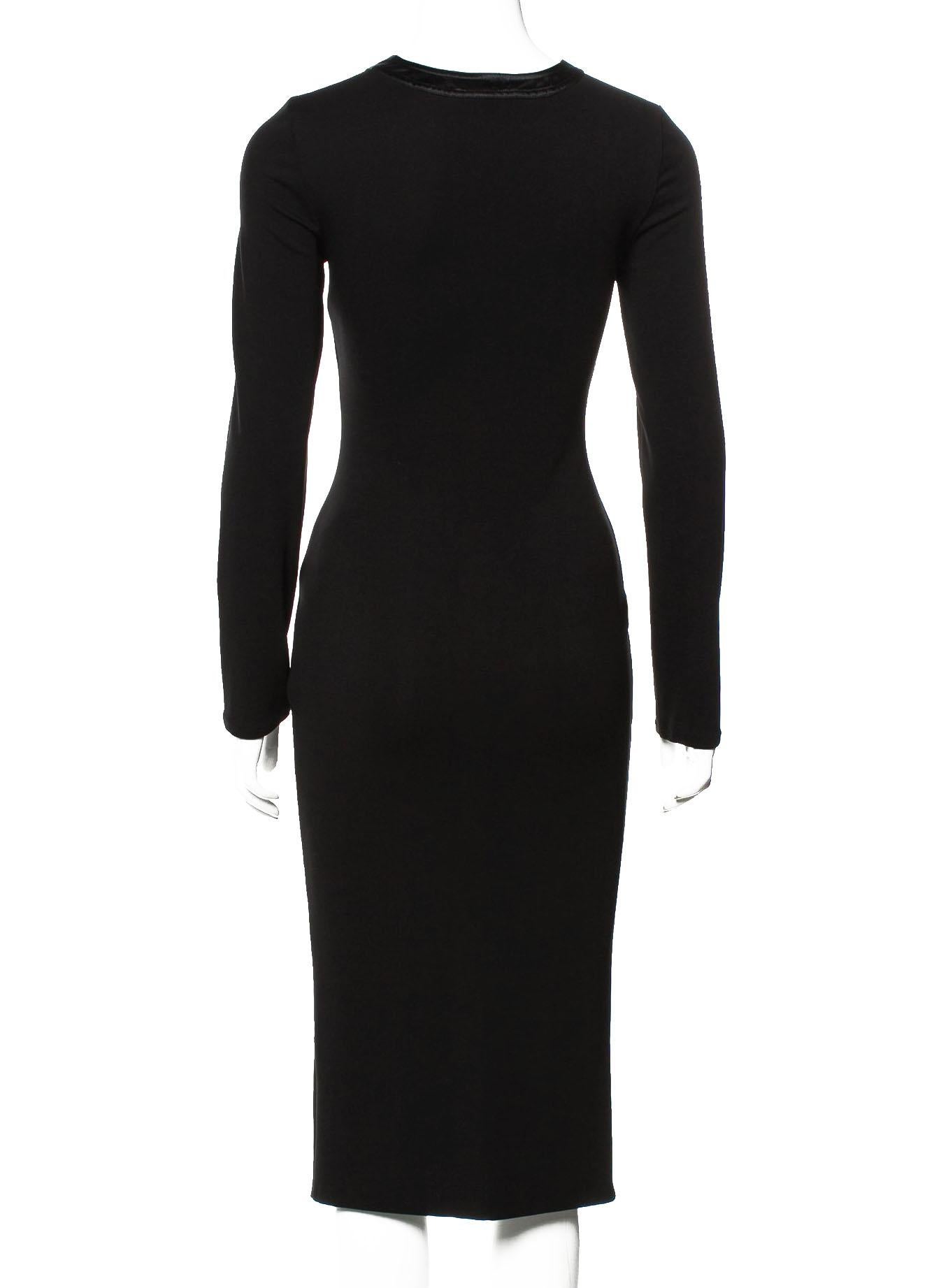 Tom Ford for Gucci Black Stretch Dress
F/W 2002 Collection
Designer size - 38
Deep V-neck style, Black satin trim, Removable tie, Very stretch.
Made in Italy
Excellent new condition.

Listing code: 02202054580224958