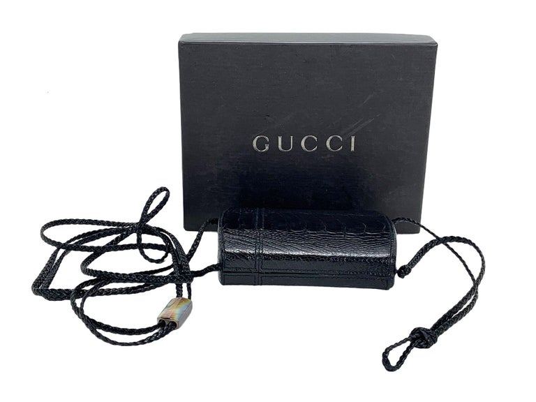 Collectible Limited Edition Gucci by Tom Ford Ostrich Black Mini Bag
F/W 2002 Collection
Serial N# 104629 - 0950
Ostrich, Adjustable Black Braided Leather Extra Long Strap, Silver Tone Metal Hardware, Black Leather Lining, Top Closure, Mother of