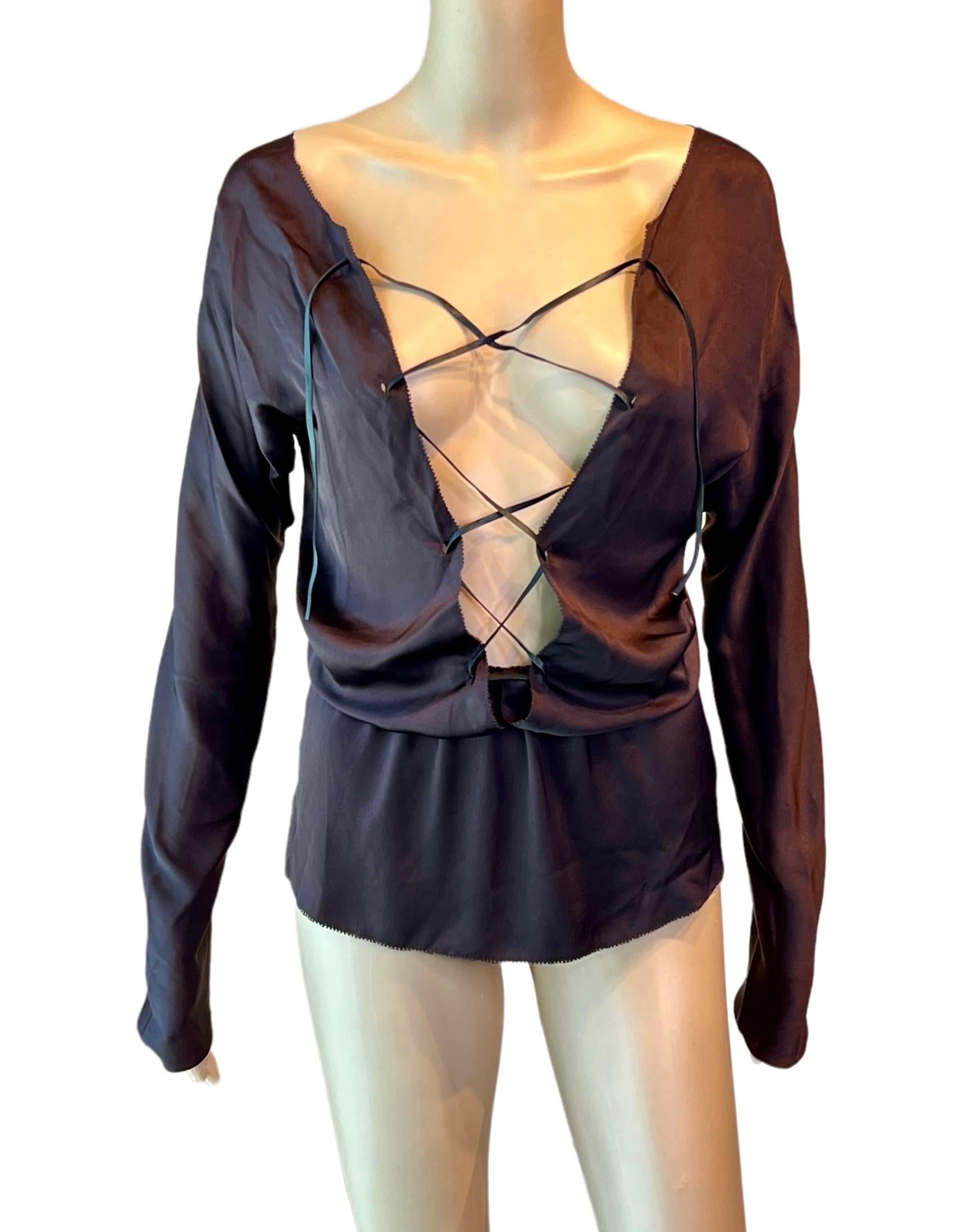 Tom Ford for Gucci F/W 2002 Runway Plunging Silk Lace-Up Brown Blouse Top IT 42

Gucci silk long sleeve brown blouse featuring plunging neckline, lace-up closure at bust, and cutout back.

