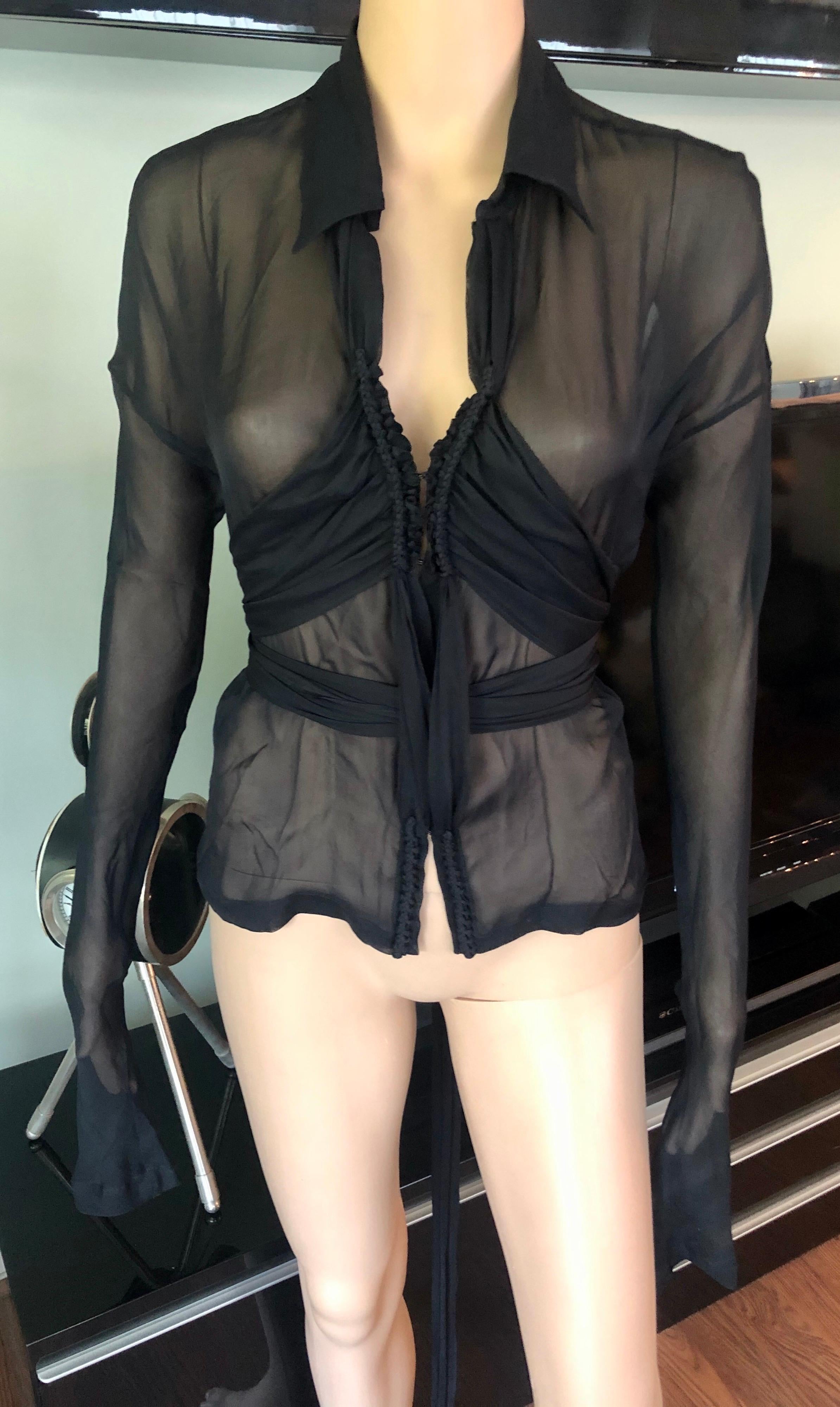 Tom Ford for Gucci F/W 2002 Silk Sheer Black Shirt Blouse Top IT 42

Gucci silk sheer black top with V-neck, long sleeves and hook-and-eye closures at front featuring tie accent.
