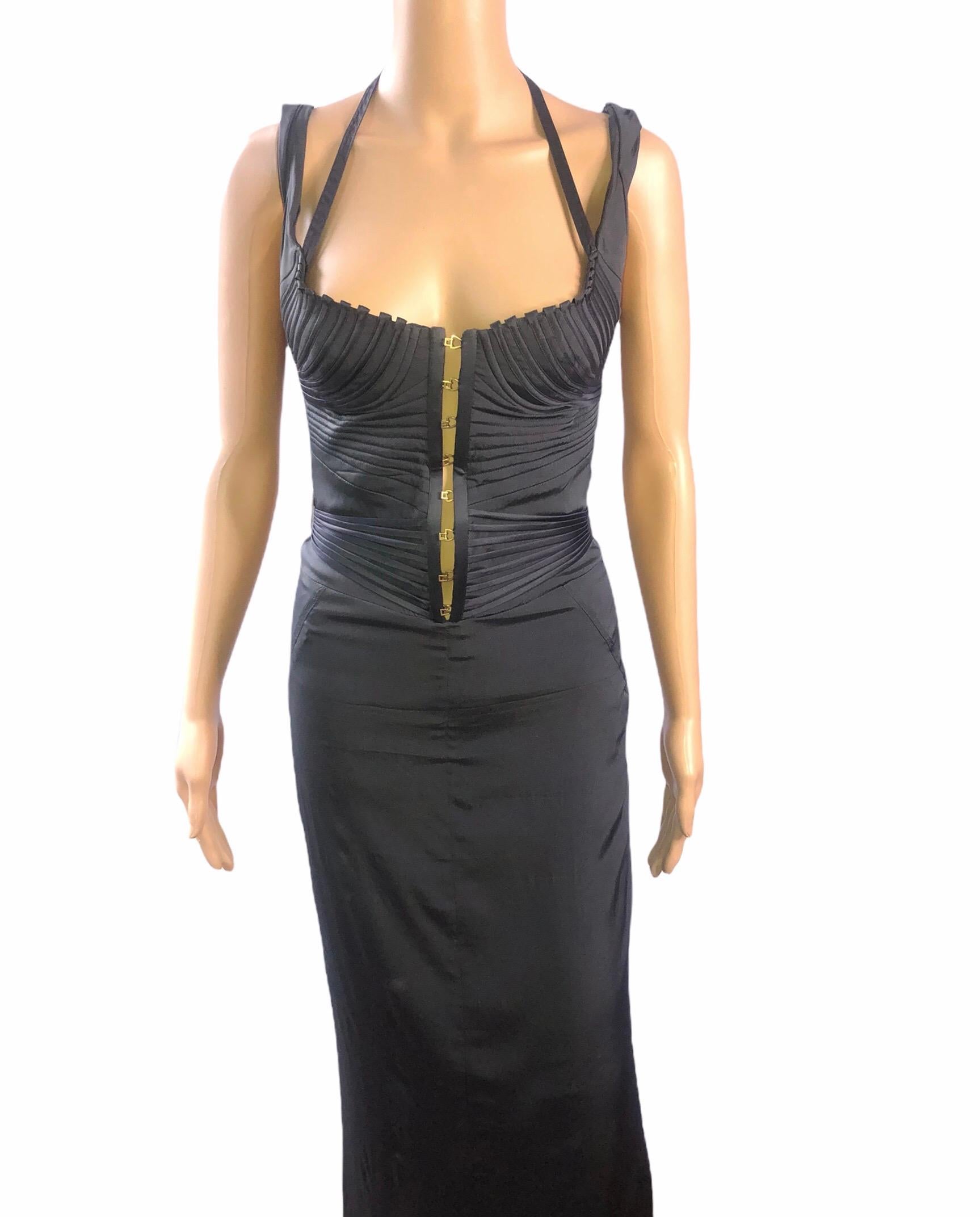 Tom Ford for Gucci F/W 2003 Bustier Corset Silk Evening Dress Gown IT 44

Tom Ford for Gucci silk evening dress with structured bust featuring concealed corset bodice, hook-and-eye closures at center front and concealed zip closure at back. 
