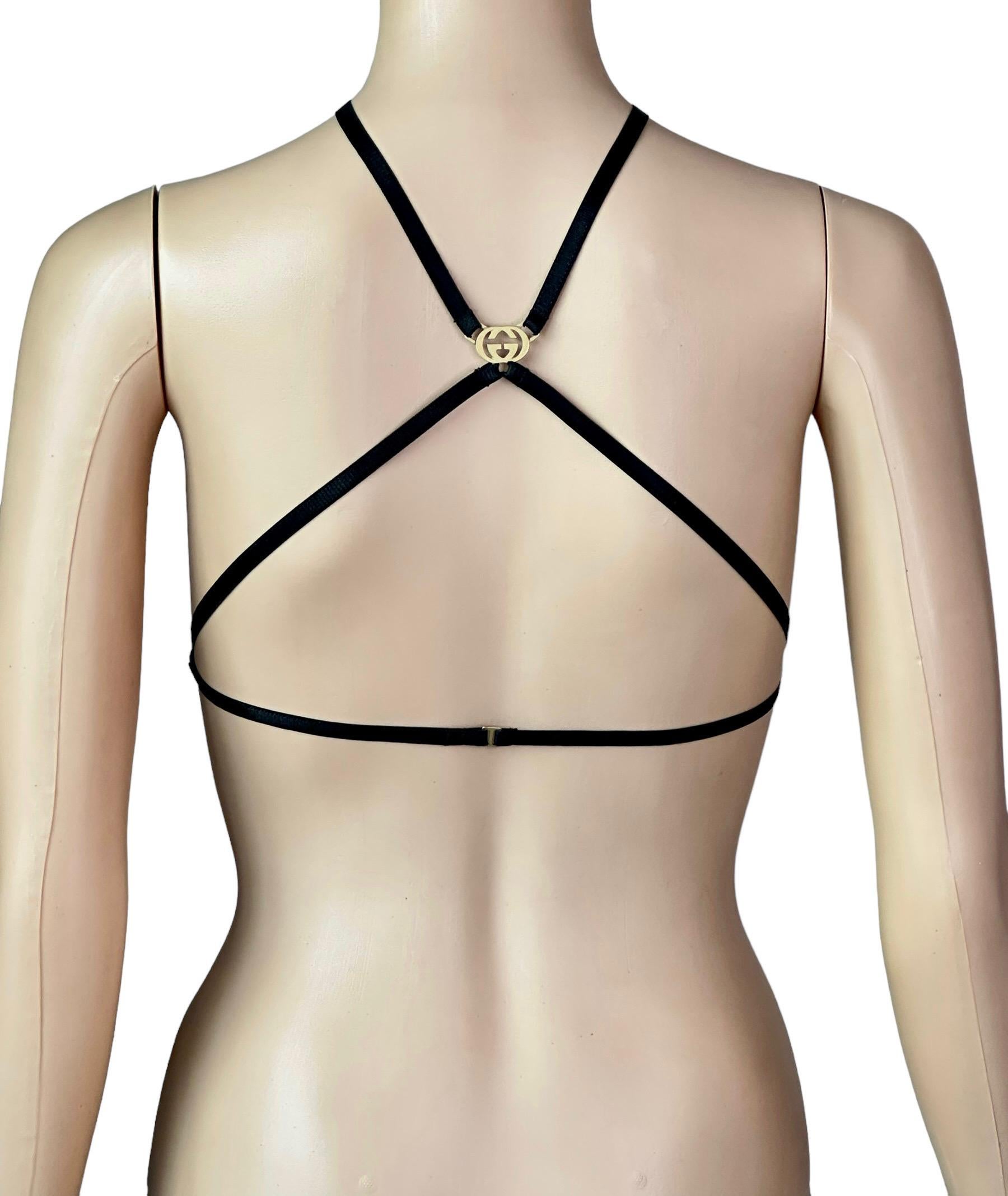 Tom Ford for Gucci F/W 2003 Gold Logo Bondage Sheer Black Bra Lingerie Size L

Please note this bra has a pull shown in the last photo and the elastic is stretched out but can easily be adjusted to fit all sizes.

