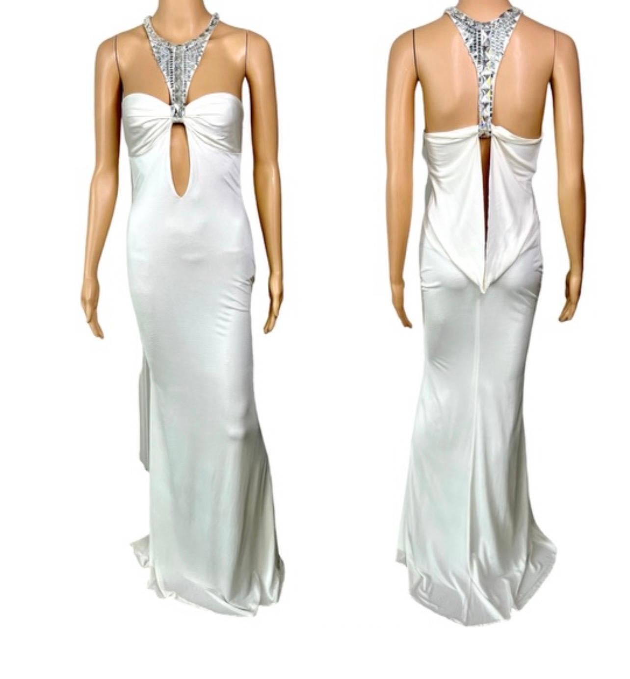 Tom Ford for Gucci F/W 2004 Embellished Plunging Cutout Ivory Evening Dress Gown IT 44

Gucci ivory evening dress featuring embellished accents at neckline and cutouts at front and back. 

