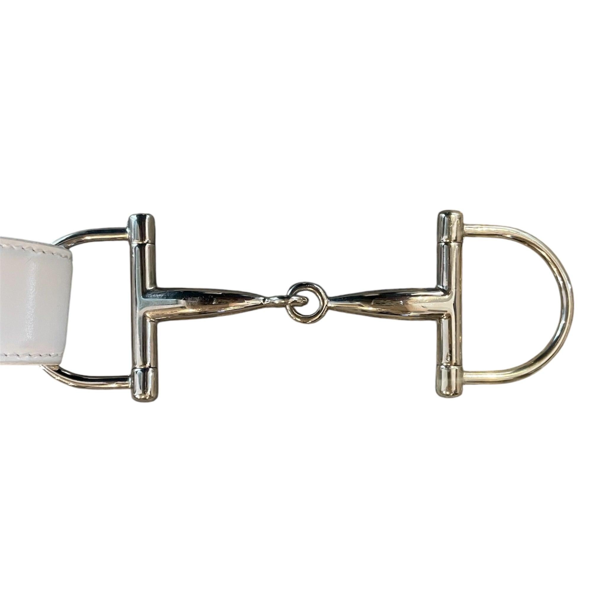 Icey white patent leather Gucci belt, designed by Tom Ford. From the Fall/Winter 1995 collection, this belt debuted in several versions on several looks on the 1995 runway. Tom Ford’s take on a Gucci house staple, the belt proudly features a sizable