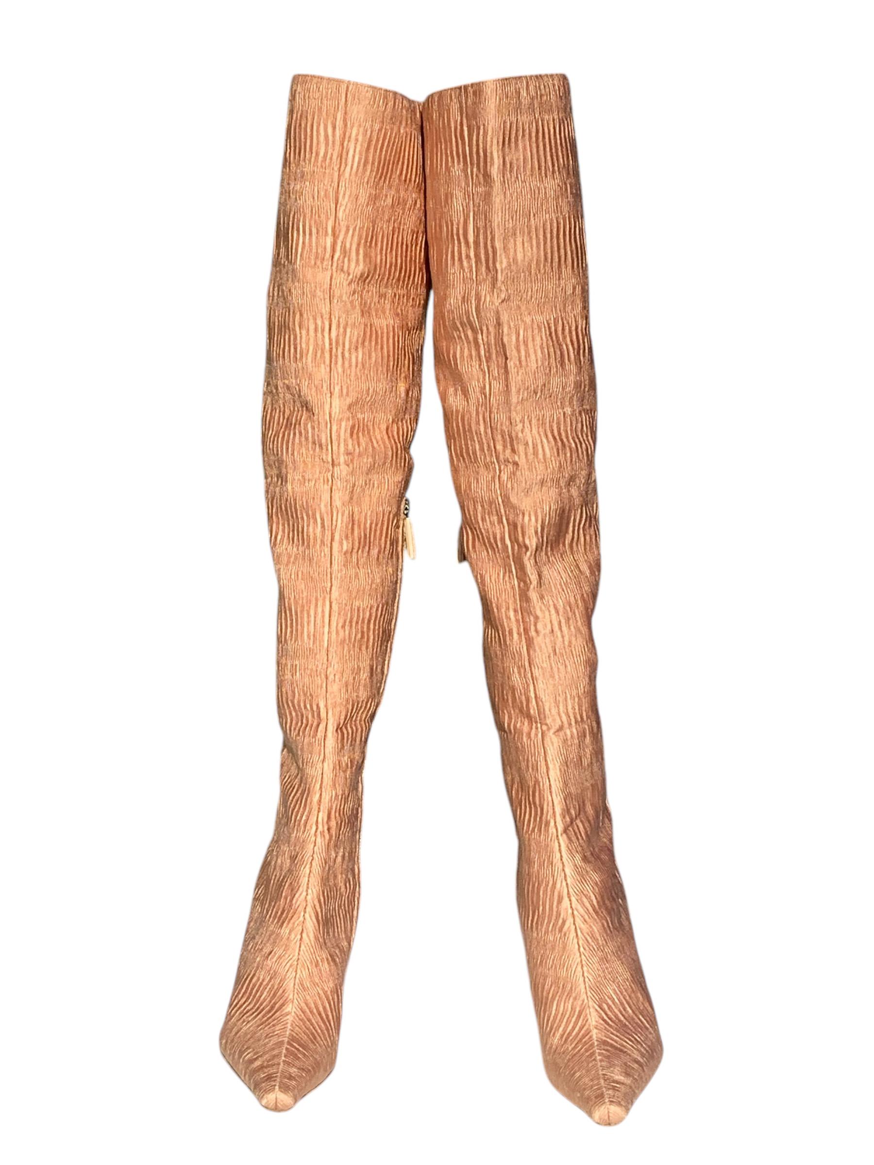 Vintage Tom Ford for Gucci Over the Knee Boots + Matching Bag
Gorgeous ruched silk over-the-knee boots by Gucci. A signature of Tom Ford’s iconic 1999 F/W collection and documented on both the runway and in print ads. 
Boots size - 6.5 C 
Pink/gold