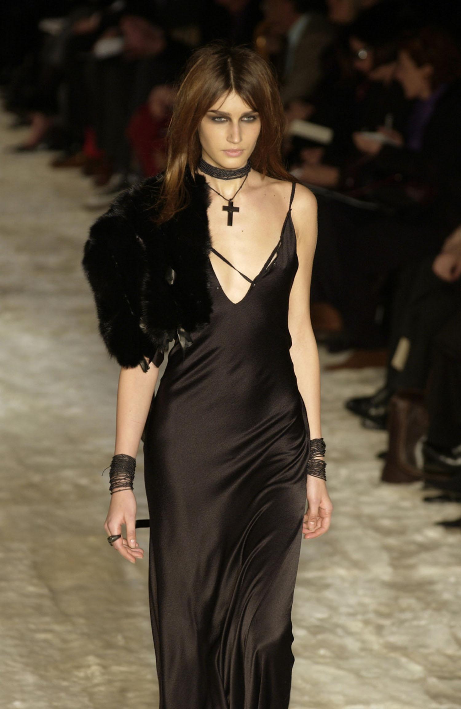 Vintage Tom Ford for Gucci Black Silk Lace-Up Gown + Mink Stole
Italian size - 38 ( can fit bigger sizes also )
F/W 2002 Runway Collection
Black silk, Bias cut, Slip-on style.
Backless to the waist with lacing down the entire length of the back of