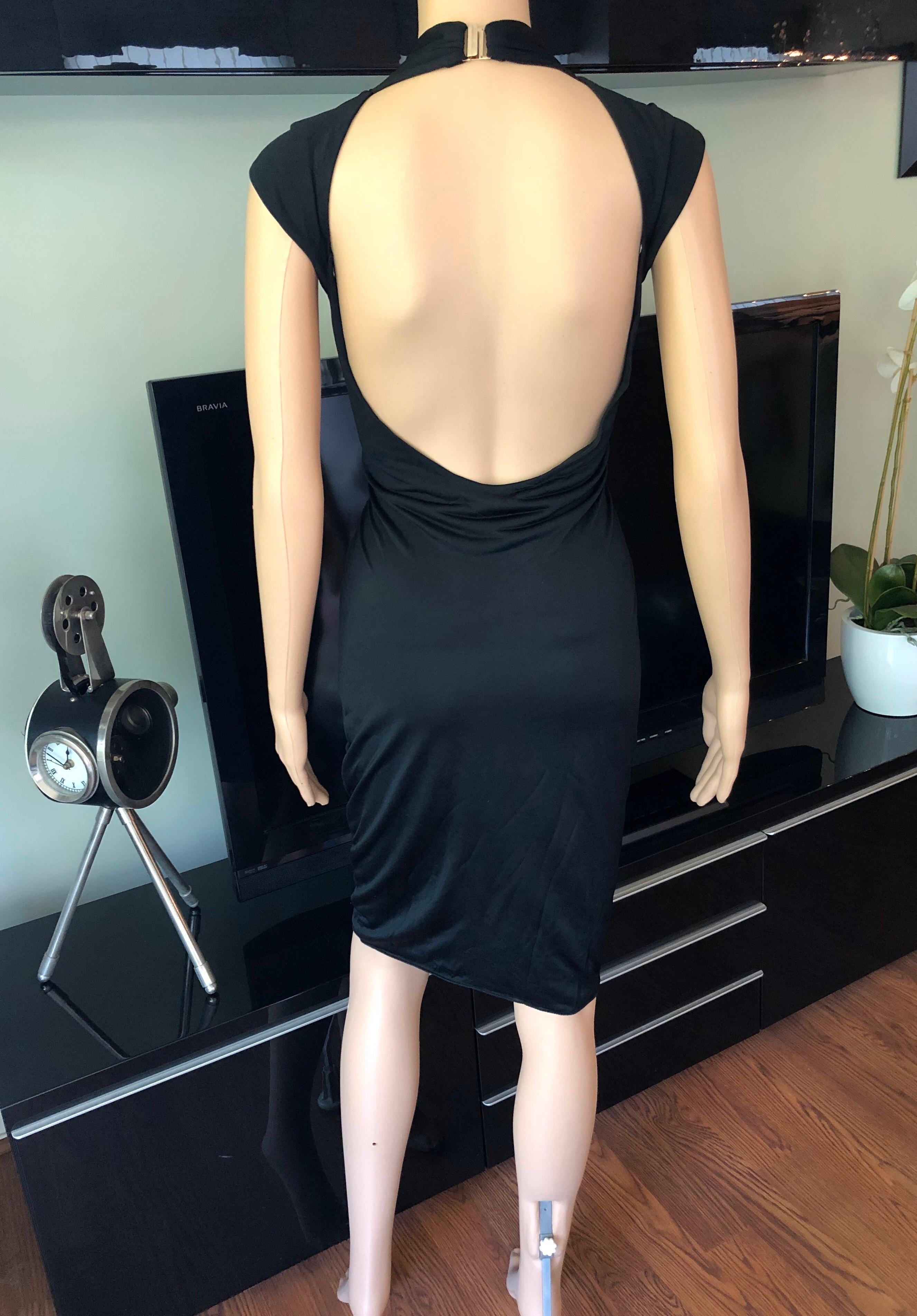 Tom Ford for Gucci Keyhole Cutout Back Black Dress XS

Gucci short sleeve dress with keyhole at front, cutout open back and hook-and-eye closure at neckline.