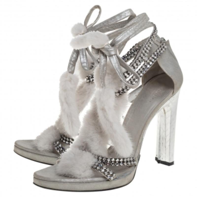 You'll find excuses to wear these gorgeous sandals by Tom Ford for Gucci that are all about high style! These sandals feature leather straps, embellishment of crystals and mink fur, ankle fastening and open toes. They are set on leather insoles and