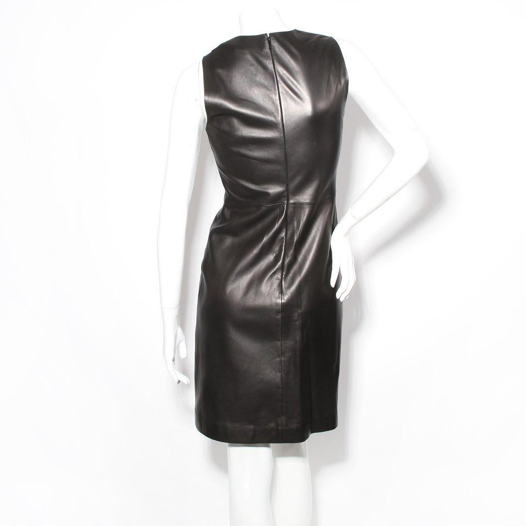 Leather Dress by Tom Ford for Gucci
Genuine black leather
Sleeveless 
Knot detail on left side of collar 
Back zip & hook closure 
Hits above the knee
Made in Italy
Condition: Excellent Condition, little to zero visible wear
Size/Measurements:
Size