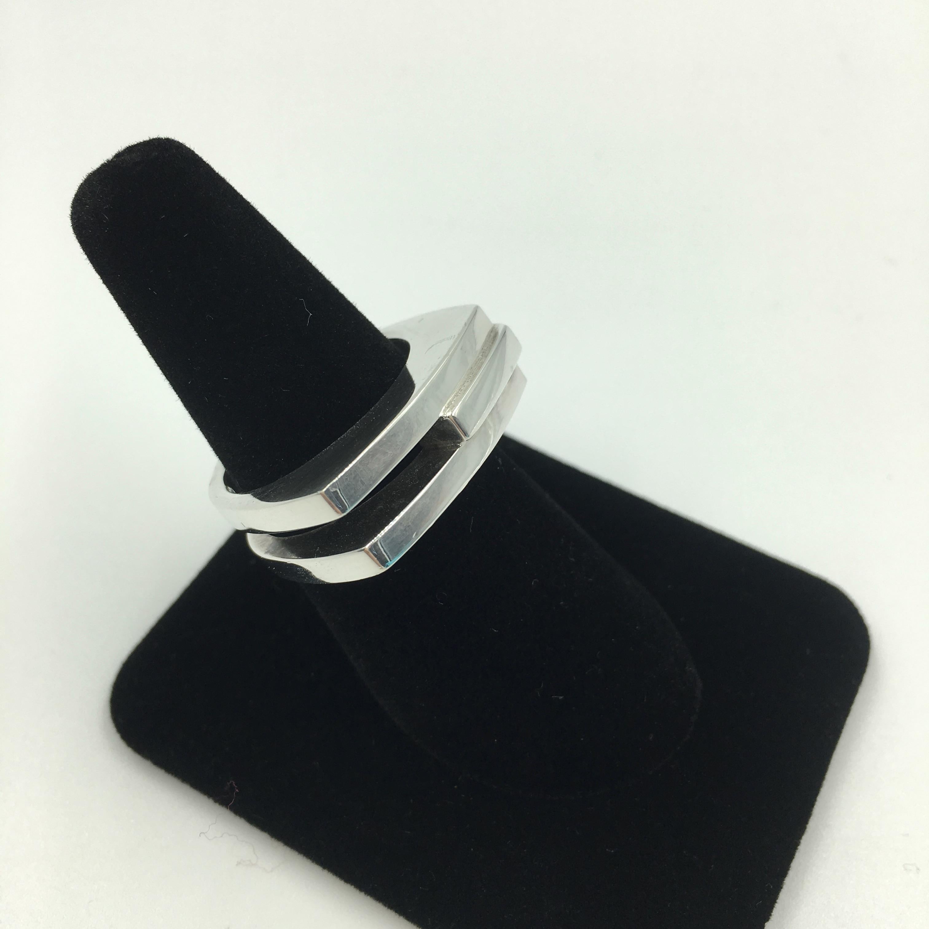 Tom Ford for Gucci Modern Three Stripe Sterling Silver Ring. Made in Italy. Stamped Gucci and 925 inside band. Good vintage condition. Small scratch on side of ring. See last photo. Unnoticeable when worn but this photo highlights it with the
