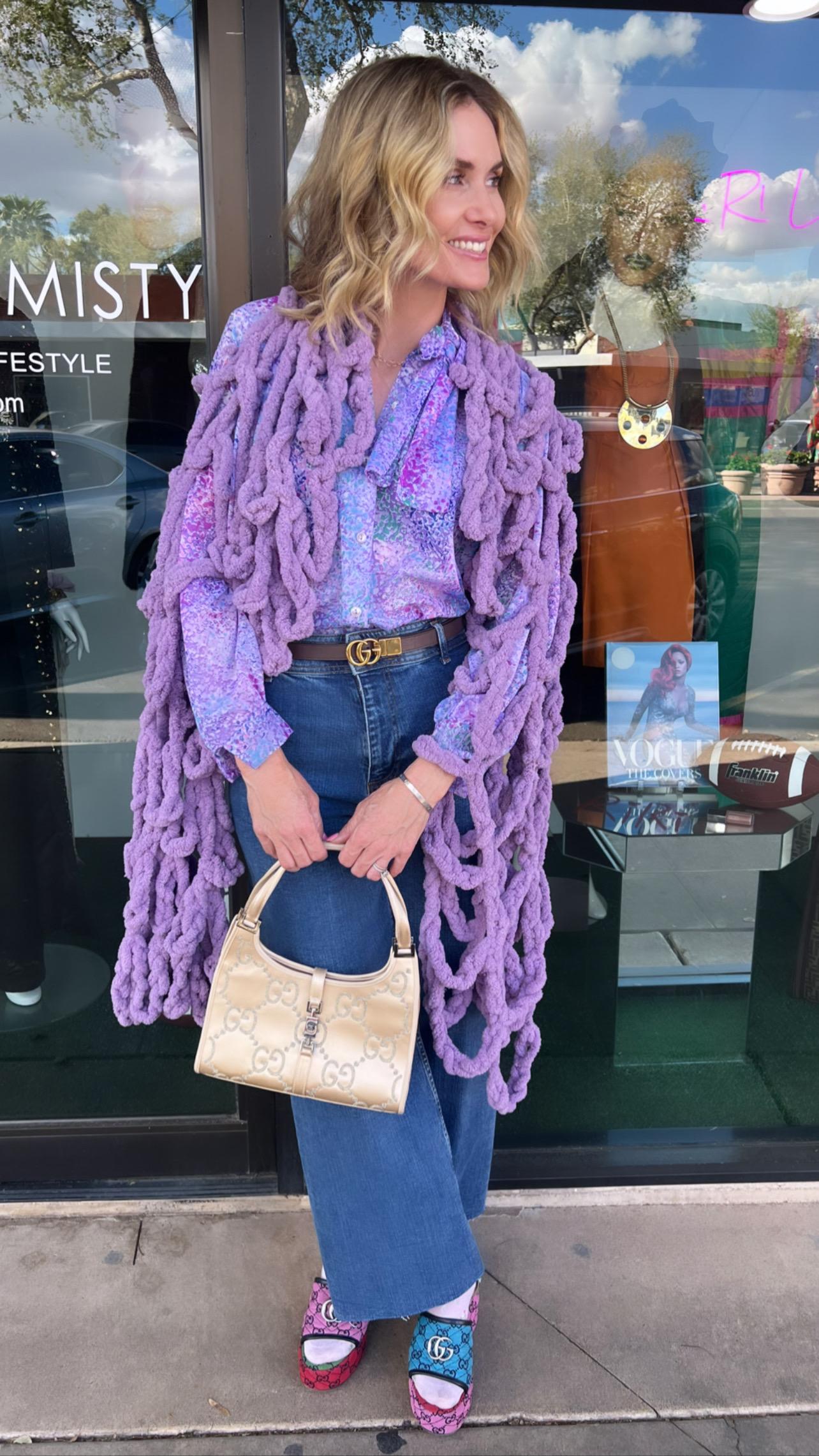 This Tom Ford era Gucci monogram cloth handbag is such a show stopper! In Gucci's extremely coveted Jackie style, this handbag is as classic and versatile as it is glamorous.  A silver signature Gucci monogram contrasts an off white satiny fabric