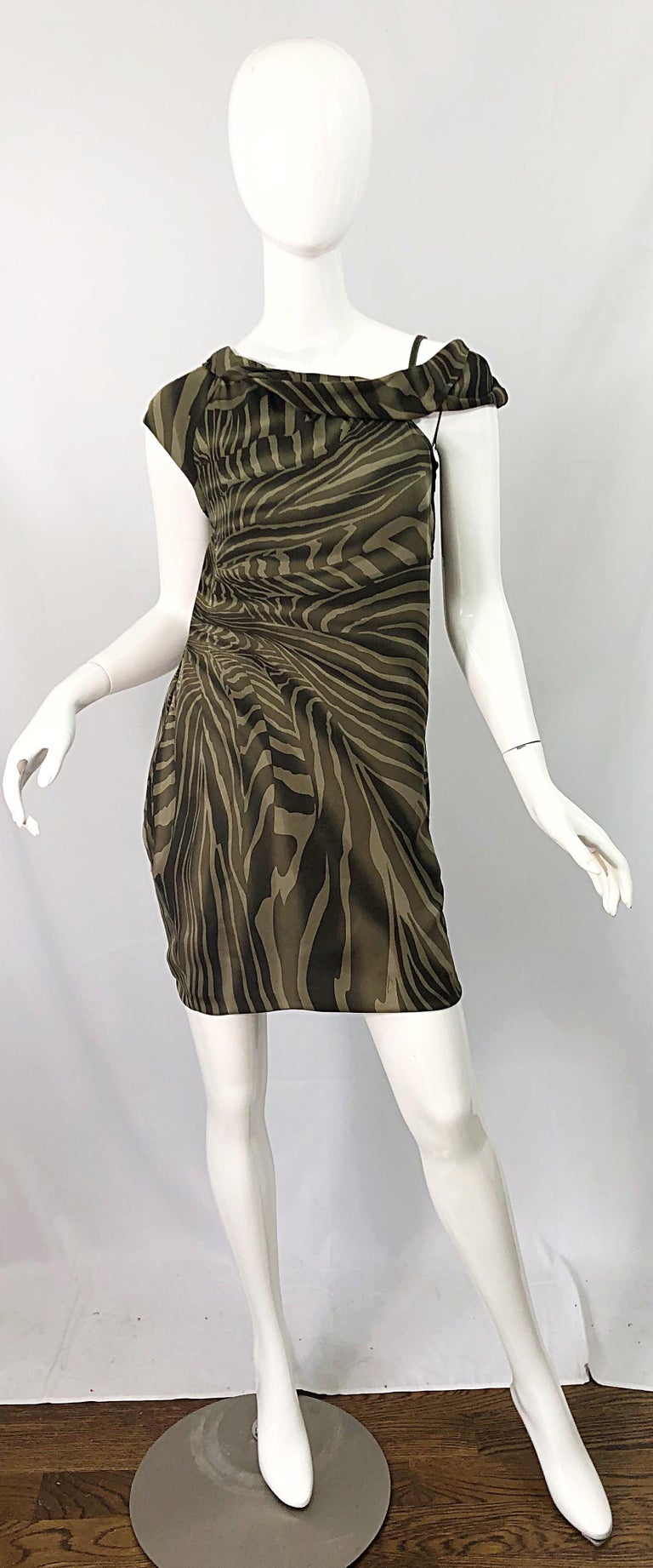 TOM FORD for GUCCI olive green and khaki zebra print silk chiffon and leather asymmetrical off the shoulder dress ! Features adjustable leather strap at top back left shoulder. Hidden zipper up the back with hook-and-eye closure. Very flattering and