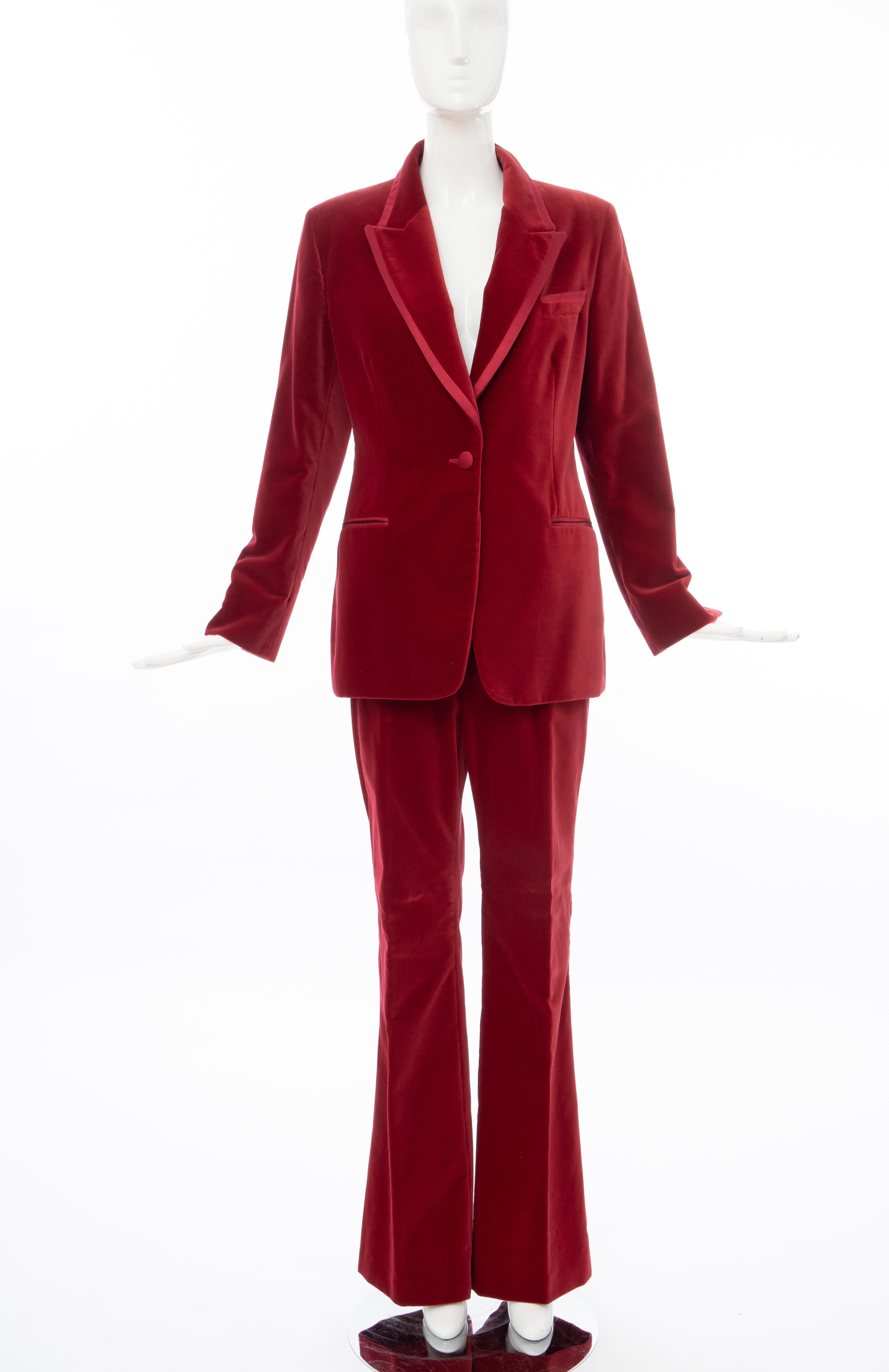 Tom Ford for Gucci, Autumn-Winter 1996, crimson cotton velvet pantsuit. Jacket features dual welt pockets at waist, slit pocket at bust, contrast panel at collar and single button closure at front. Pants feature dual slit pockets at waist, dual welt