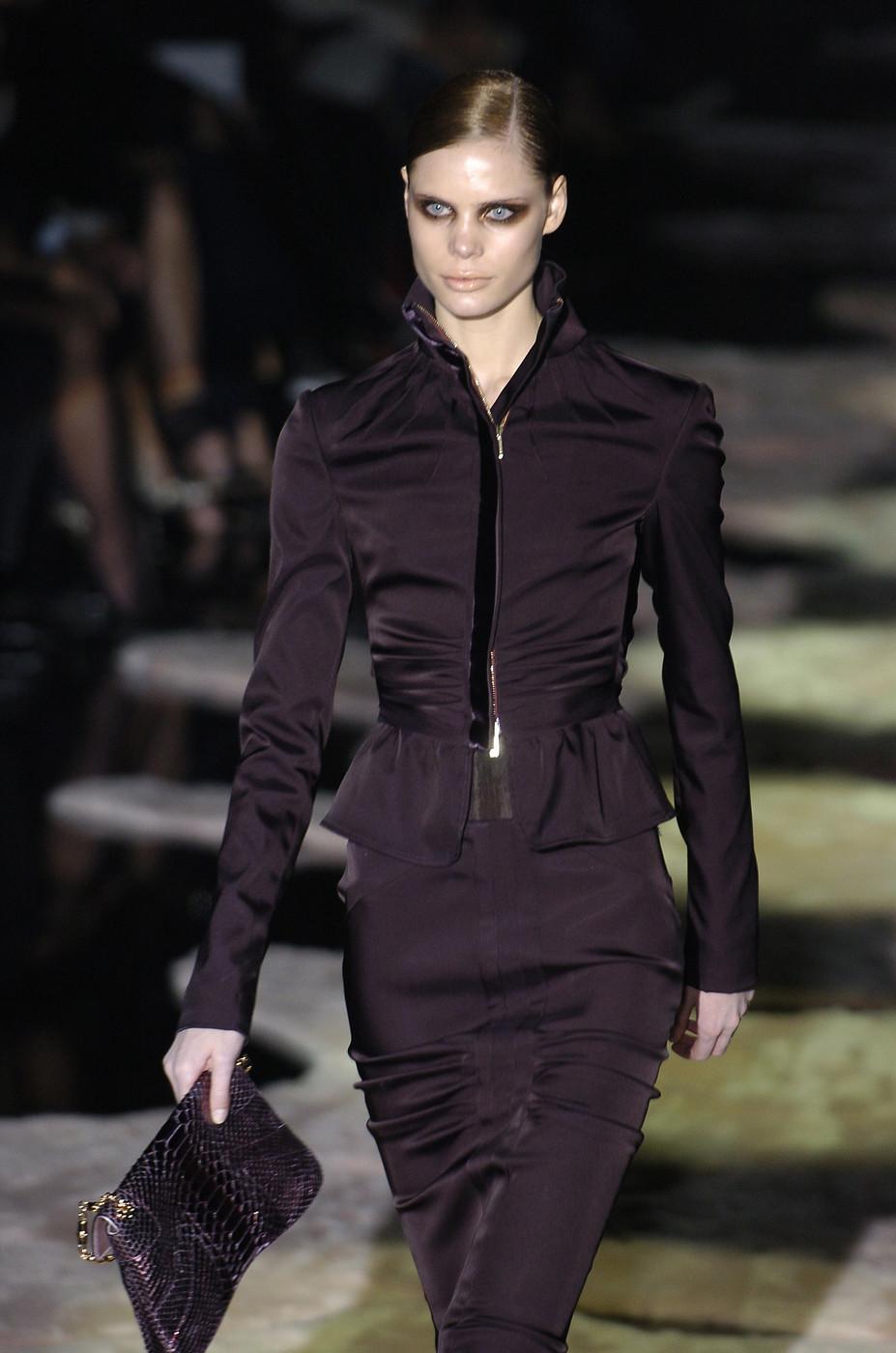 Tom Ford for Gucci Black Stretch Dress Skirt Suit
F/W 2004 Collection - Look # 1
The emotional ending of the Tom Ford era at Gucci was a look back in glamour—a fabulous farewell in which this perfection-obsessed superstar of fashion seized the