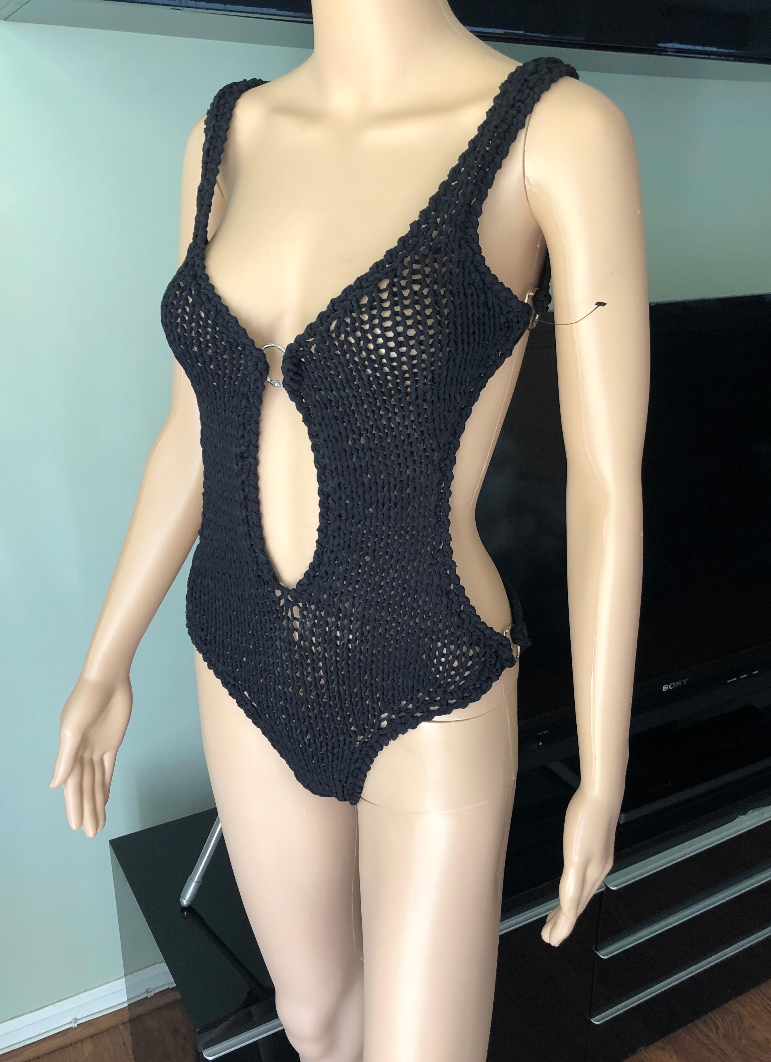 Tom Ford for Gucci S/S 1995 Runway Cutout Knit Woven Black One-Piece Bodysuit Swimsuit IT 42

Gucci knitted woven one-piece swimsuit featuring plunging neckline, cutout accents and open back.
