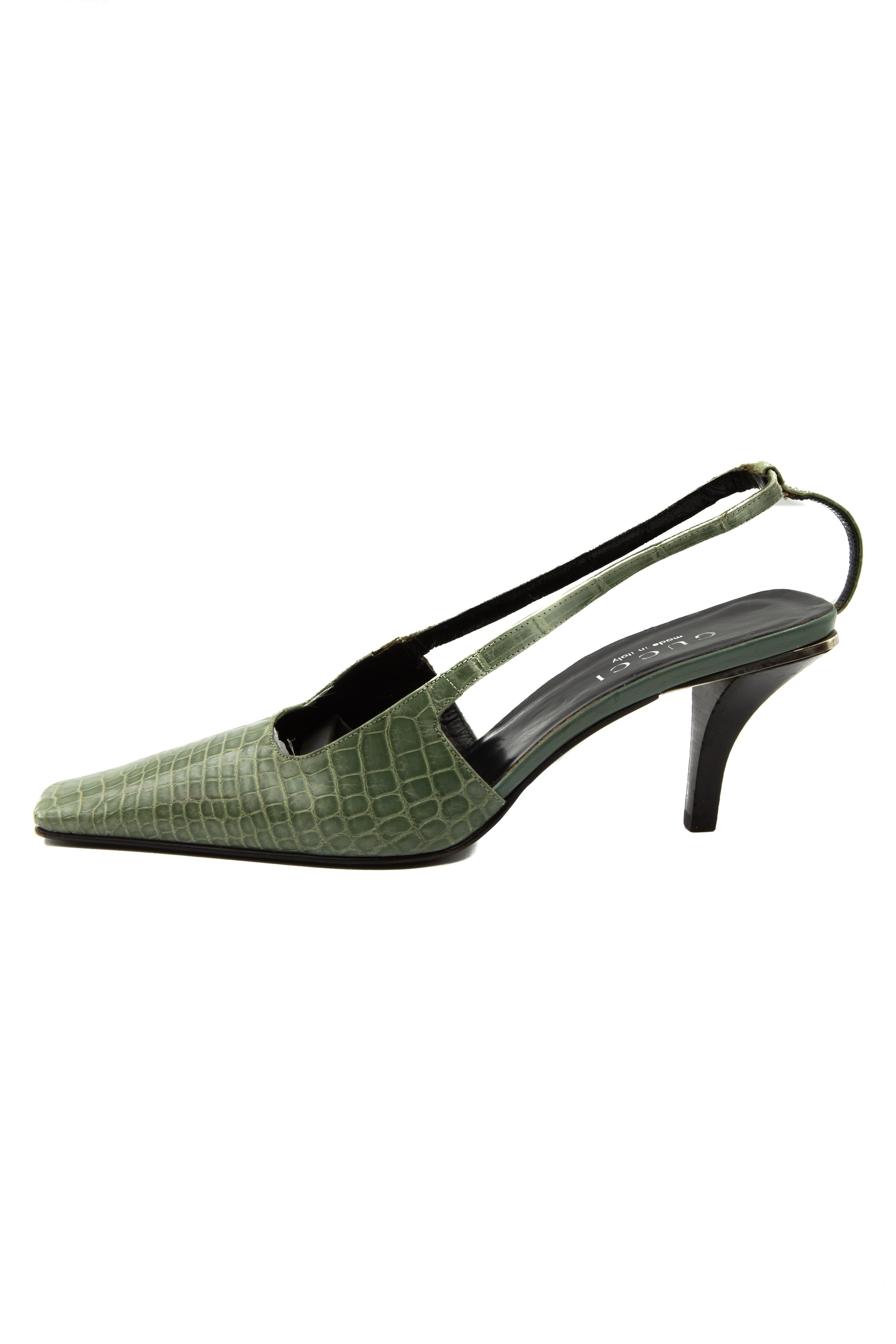 Tom Ford for Gucci Green Crocodile Mule Heels
S/S 1998 Collection
Size 36.5C
Limited Edition, Genuine Crocodile, Crystal G on One Heel, Leather Insole & Sole, Heel Height - 3 inches.
Made in Italy.