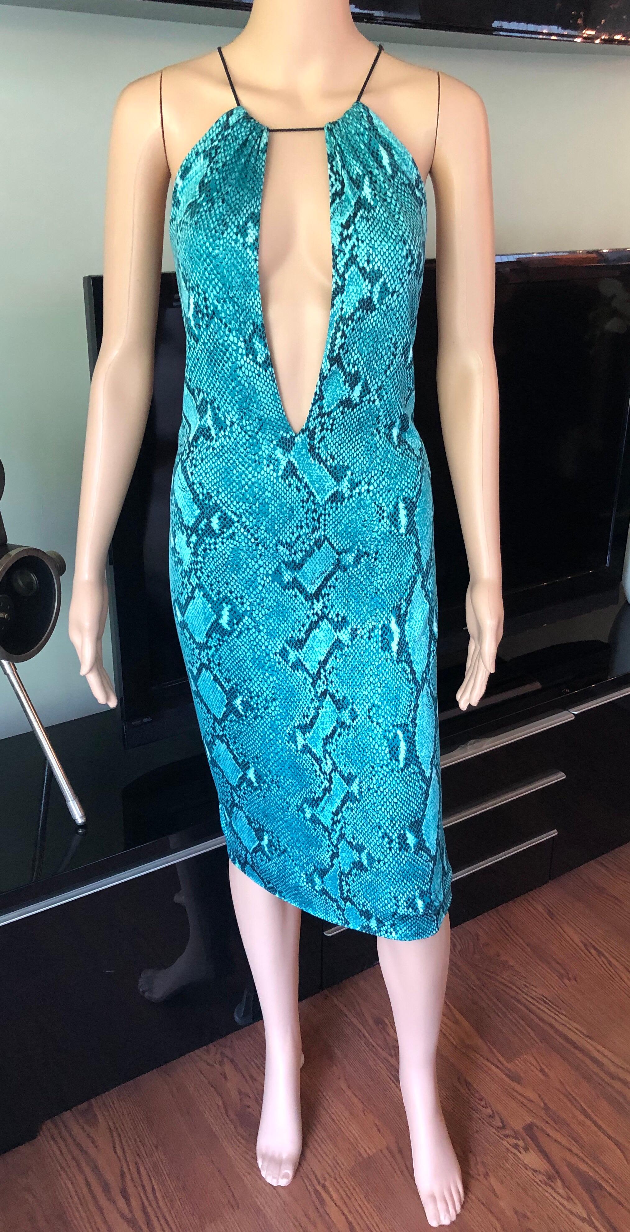 Tom Ford for Gucci S/S 2000 Runway Campaign Python Print Plunged Halter Dress IT 38

Gucci midi dress featuring python print throughout, halter neck with cutout and push lock metal clasp closure at shoulders. 