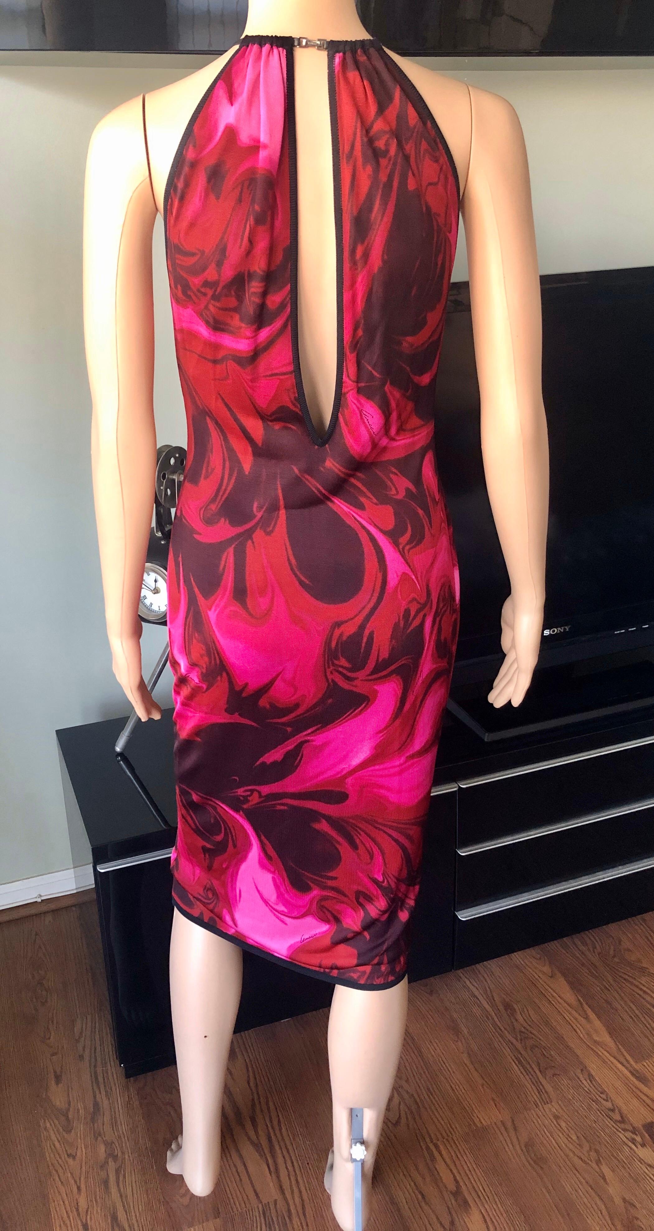 Tom Ford for Gucci S/S 2001 Bodycon Knit Printed Midi Dress

Tom Ford for Gucci knitted dress featuring red, pink and black abstract print and cutout back.
Please note size tag is missing. Please see below the approximate measurements:
Chest - 15