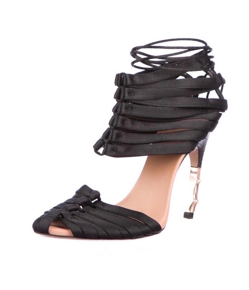 Tom Ford for Gucci Black Satin Corset Shoes
S/S 2004 Runway Collection
Italian size 36 C - US 6 C 
Color - Black, Crocodile and Bamboo Metallic Heel - 4 inches, Lace-Up Closures at Counters.
Made in Italy.
Gently worn, in great condition.