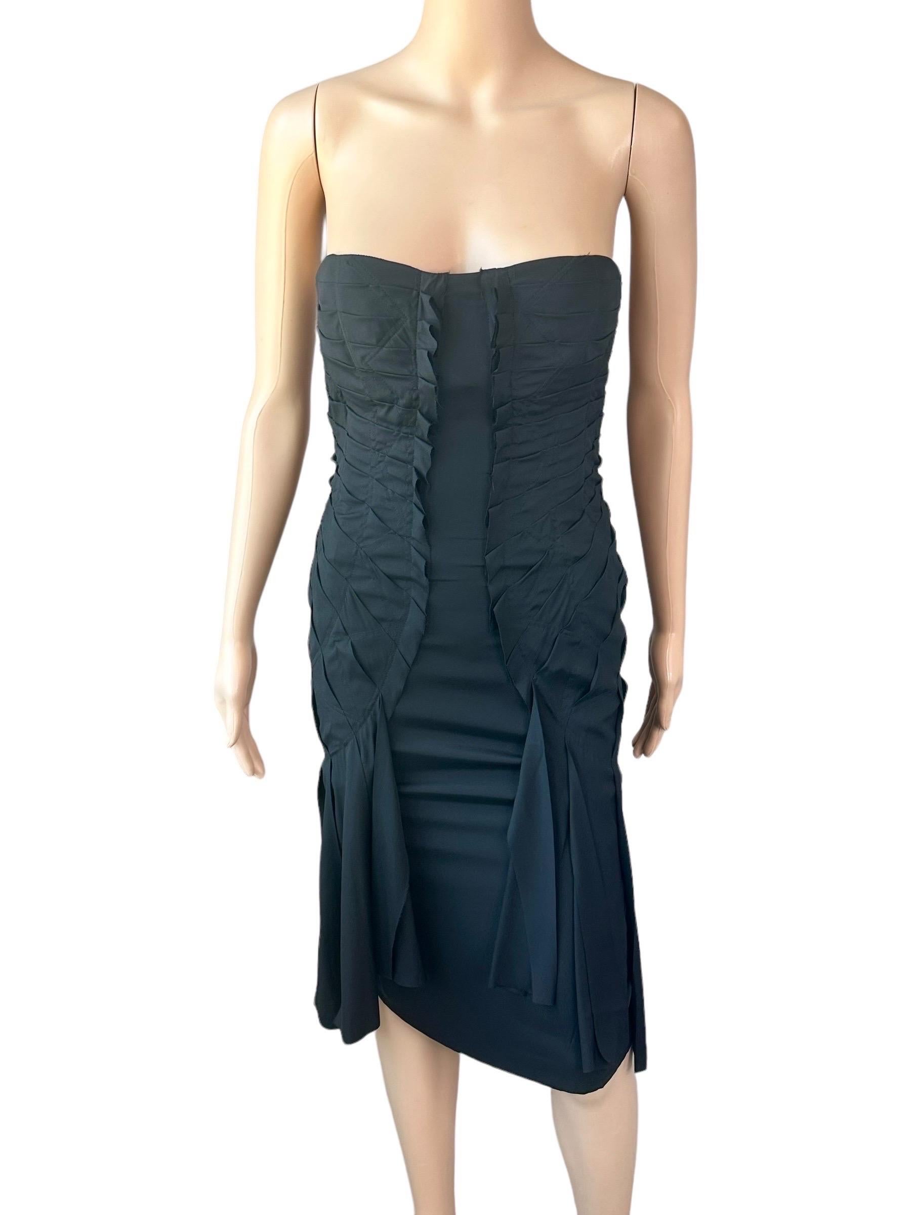 Tom Ford for Gucci S/S 2004 Runway Bustier Cutout Back Strapless Fringe Silk Black Dress

Gucci by Tom Ford black strapless stretchy silk dress featuring bustier plunging neckline, fringe trim at hem, frayed raw detail, cutout back and concealed zip