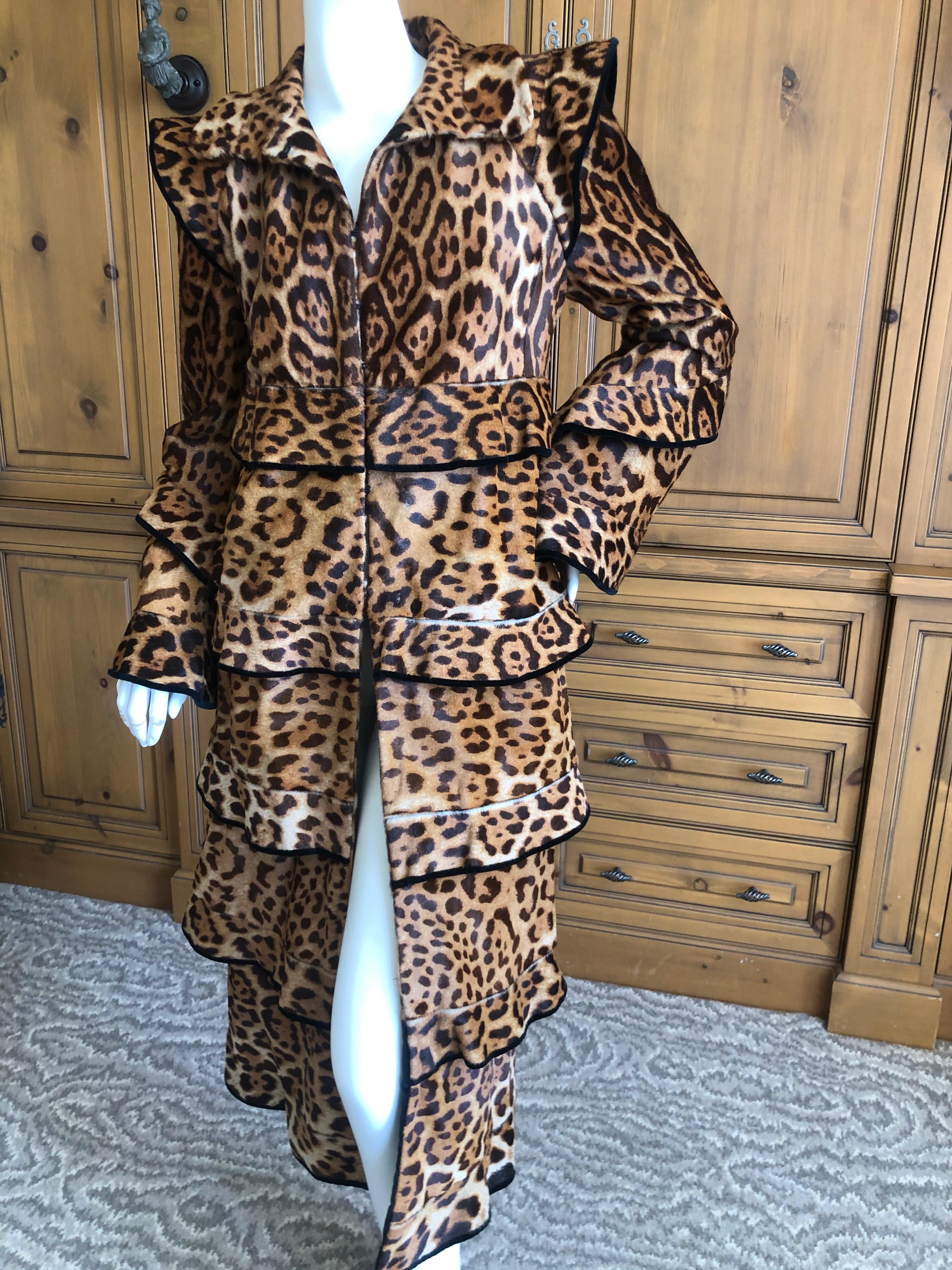 Tom Ford for YSL Fall 2004 ponyskin fur leopard print pagoda coat.
From Tom Ford's final YSL Collection which took inspiration from the orient of YSL's Opium era.
This is the iconic image from that collection, the leopard pagoda coat.
Excellent pre