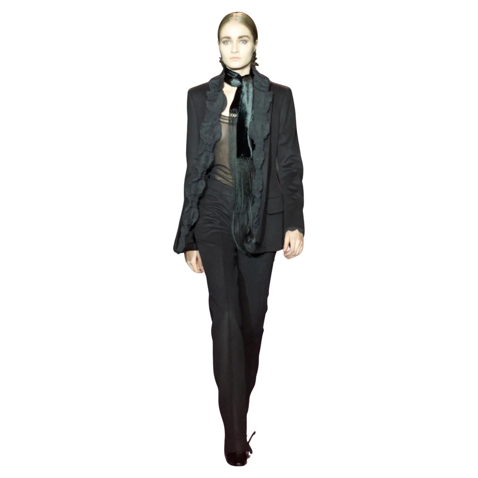 TOM FORD for YSL Runway FW 2001 wool Blazer with Ruffle Detailing (black) FR38

Collection: Fall 2001 Ready-to-Wear; 
Country of production: France
Model Danita Angell walks the runway during the Yves Saint Laurent Ready to Wear Fall/Winter