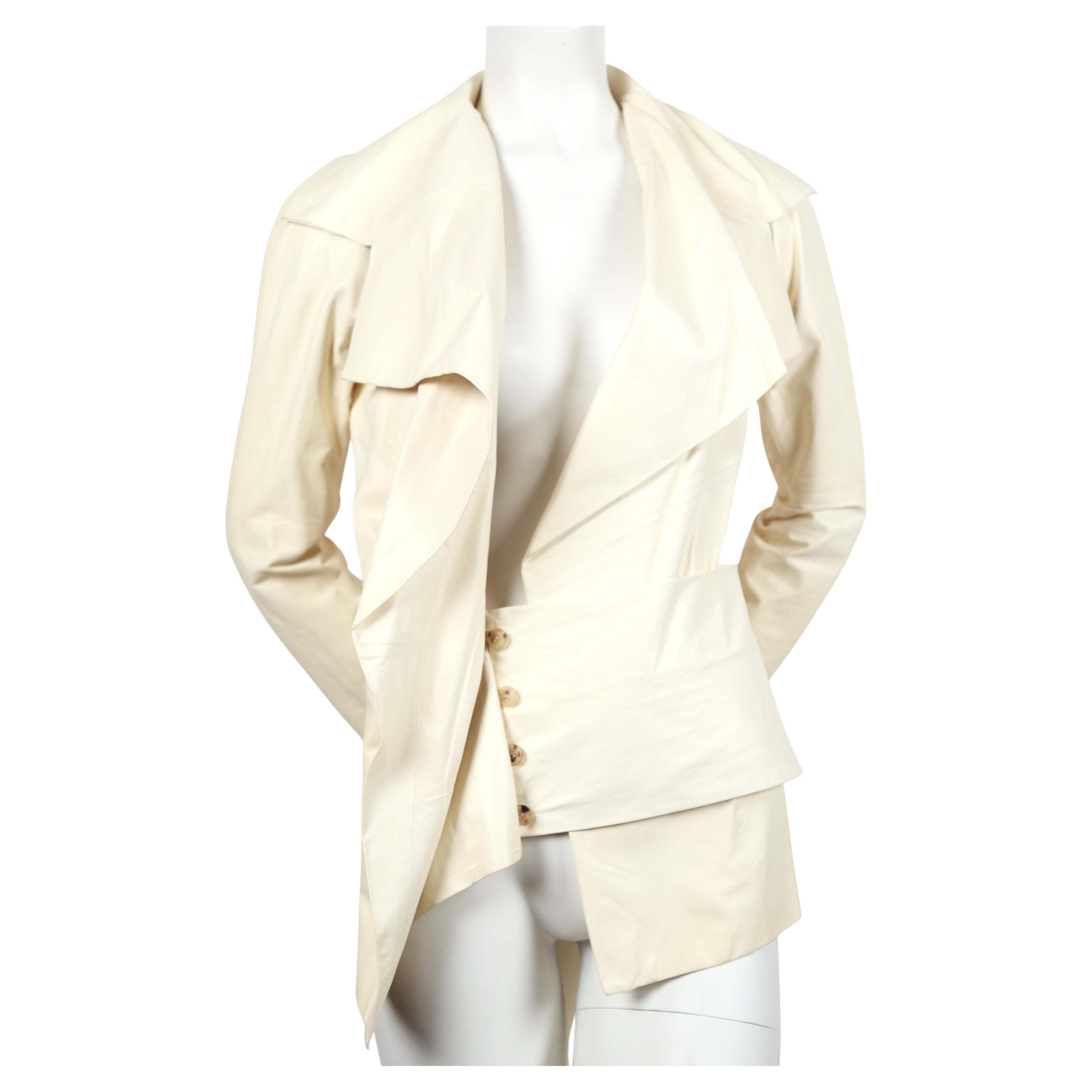 Off-white lambskin leather jacket with unique wrap closure designed by Tom Ford for Yves Saint Laurent spring 2004 exactly as seen on the runway. Belt can be worn at waist or hips. Jacket is labeled a French size 38 although this also fits a FR 36.