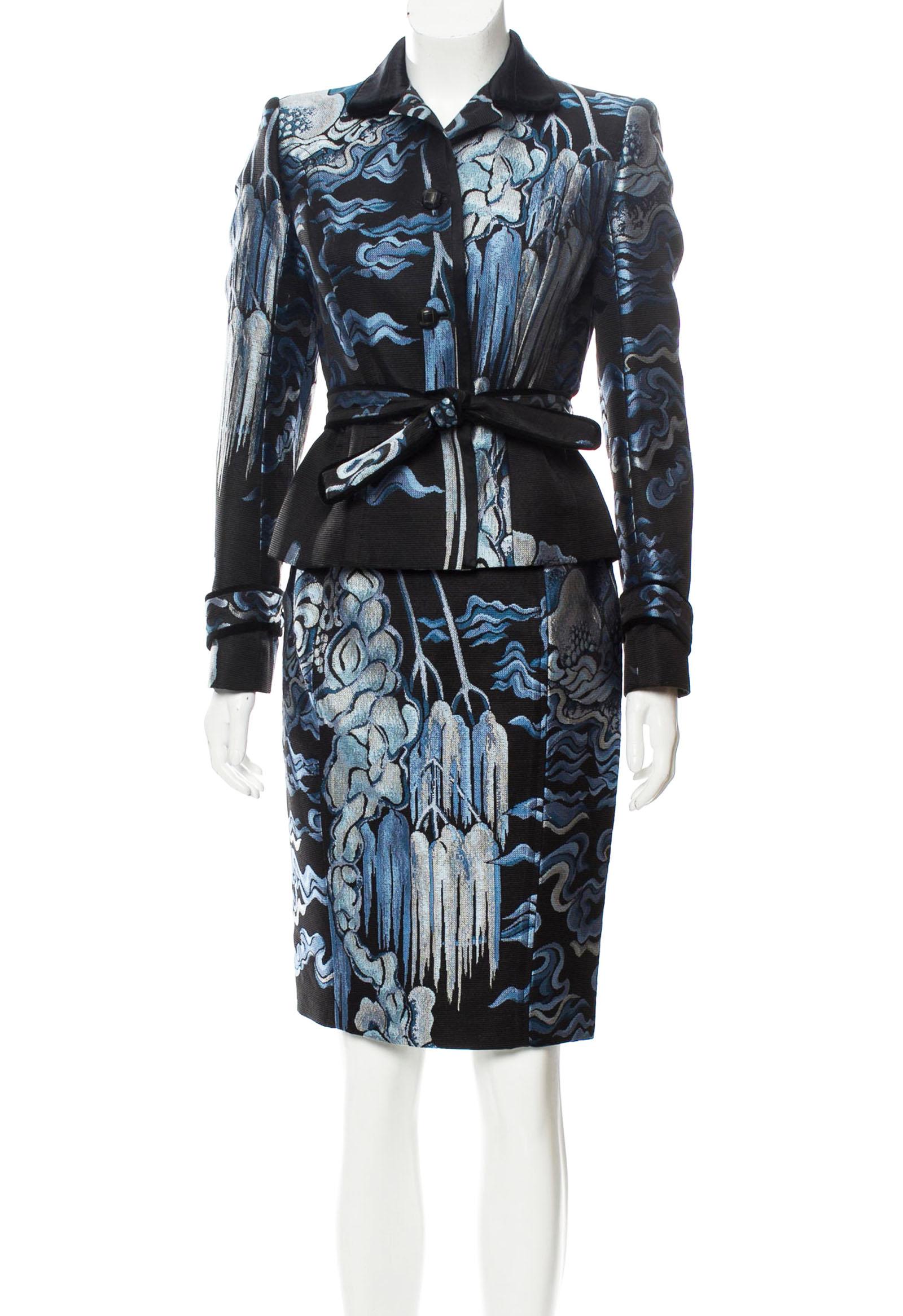 Tom Ford for Yves Saint Laurent Chinoiserie Skirt Suit
Inspired by the 1977 Chinese Collection that coincided with the launch of Opium.
F/W 2004 Collection
French size 38
A mixture of Light, Silvery-Blues, Bright and Deeper Blues with Black.  57%