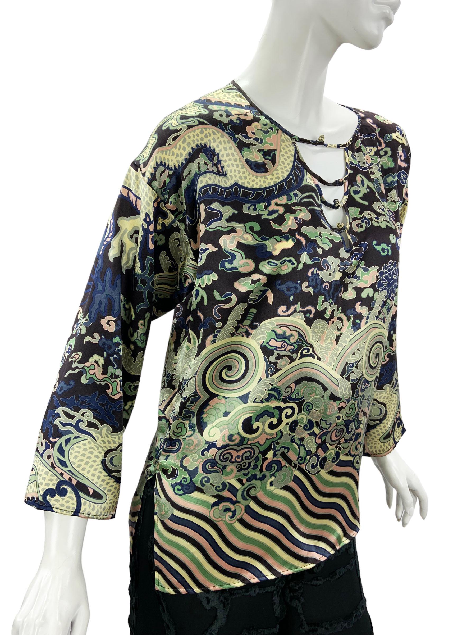 Rare Tom Ford for Yves Saint Laurent Rive Gauche Silk Top Blouse
F/W 2004 Collection
French size 38 - US 6 ( oversize, please check measurements).
Chinoiserie Inspired Silk Printed Blouse in Various Shades of Black, Blue, Green, Yellow and a touch