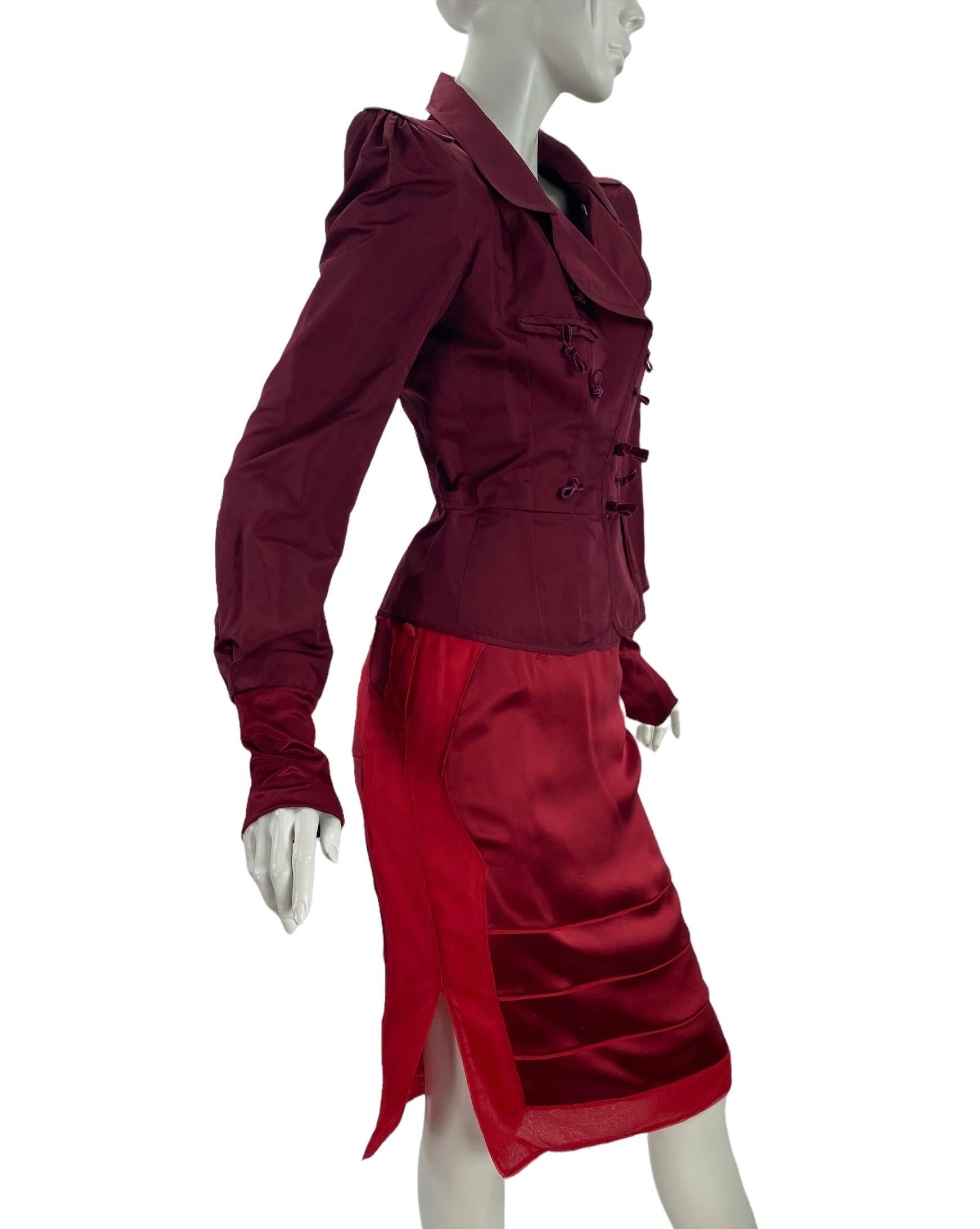 Tom Ford for Yves Saint Laurent Skirt Suit.
F/W 2004 Collection
Country/Region of Manufacture: France
Color:  Burgundy/Red, Material: 100% Silk.
Jacket FR Size 38 - US 6 
Measurements: bust - 36 inches, waist - 28