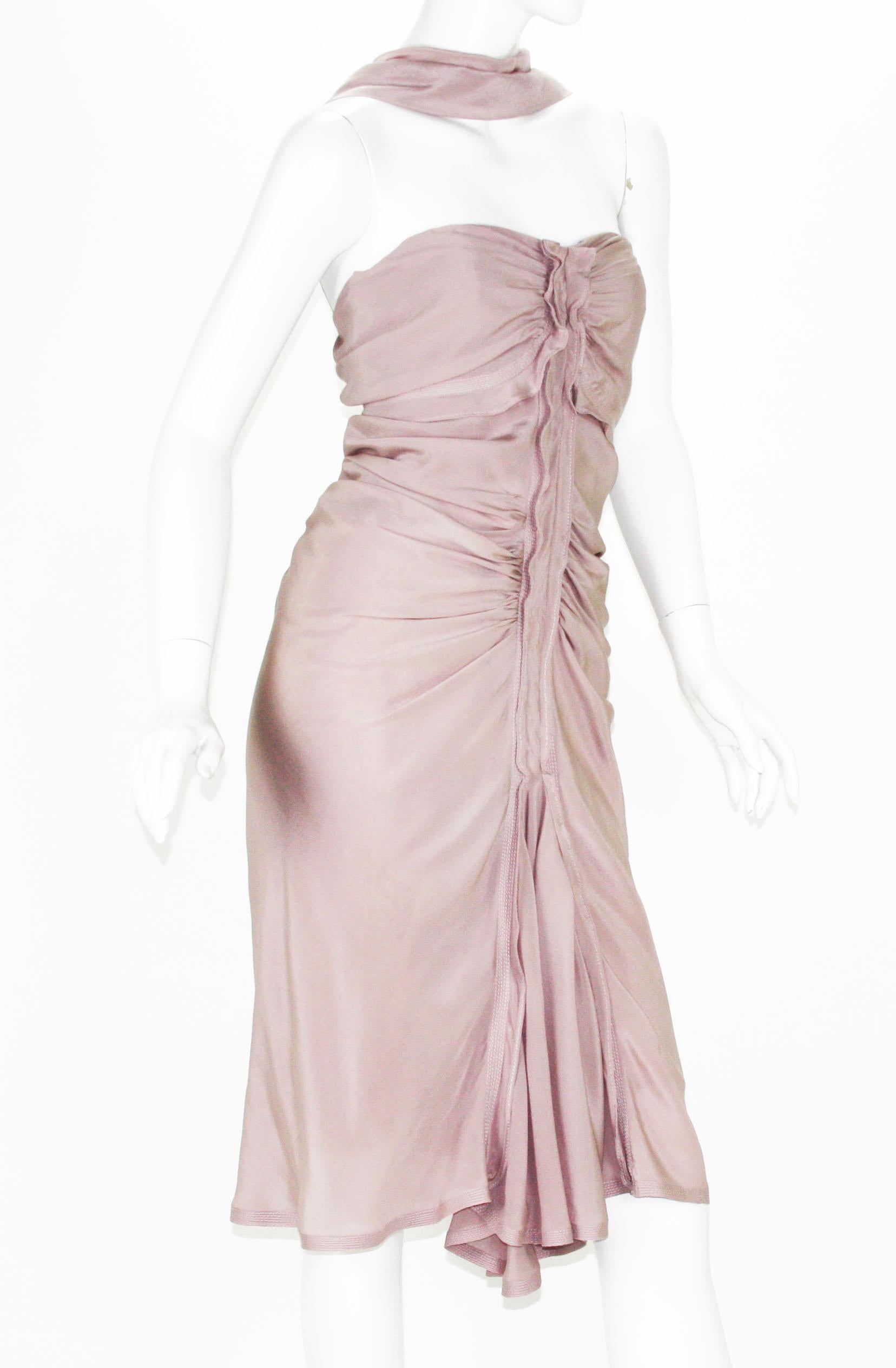 Tom Ford for Yves Saint Laurent Rive Gauche Draped Silk Cocktail Dress
Fall/Winter 2003 Collection
Fr. size 38 - US 6
100% Silk, Rare Mauve Color, Light Weight Corset, Reverse Neckholer, Draping Details, Hand-Stitching Details, Fully Lined.
Made in