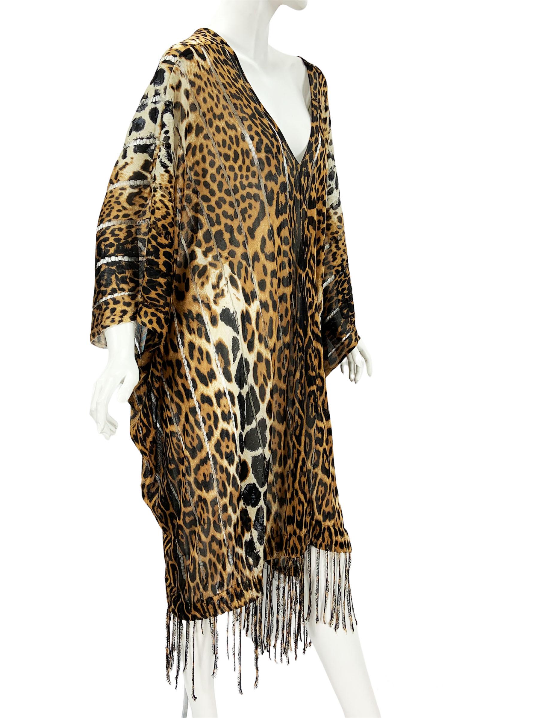 Tom Ford for Yves Saint Saint Laurent Rive Gauche Caftan.
S/S 2002 Runway Collection
100% silk, with fringe hem. Iconic YSL leopard / cheetah print.
Crochet detail throughout. This is an incredible Museum worthy piece!
Designer size - M. Will fit