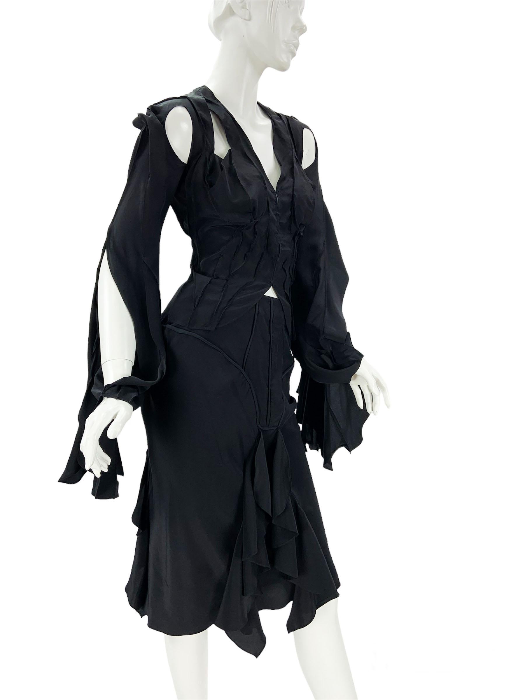 Tom Ford for Yves Saint Laurent Rive Gauche Skirt Suit
S/S 2003 Runway Collection - Look 9
French size 38 - US 6
100% Silk, Black Color.
Top - Cutout Details, Bell Sleeve, Hook and Eye Closure.
Length - 21 inch, Bust - 36