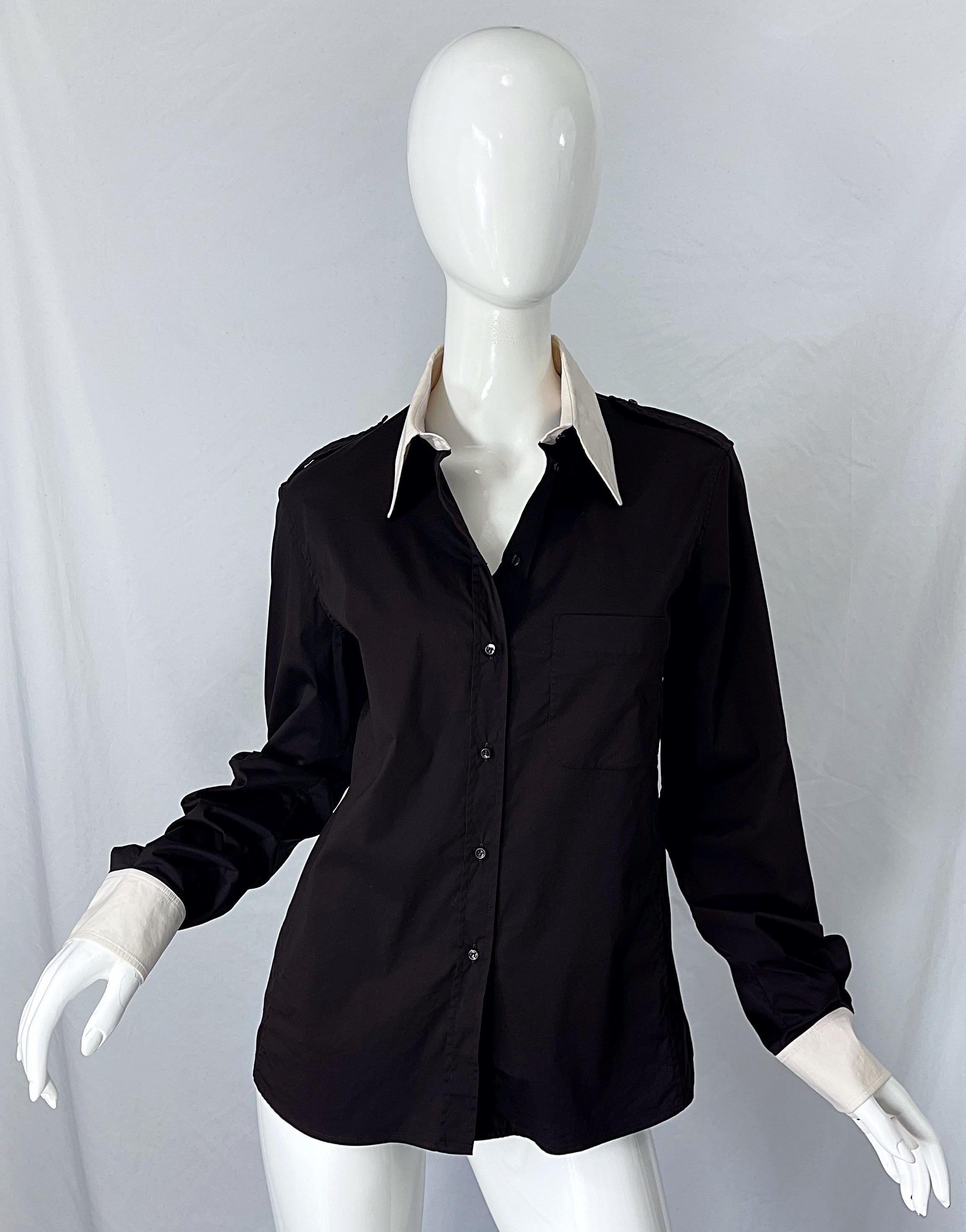 Chic YVES SAINT LAURENT YSL by TOM FORD black and white button up shirt ! Features a stylish tailored fit. White collar and cuffs. Soft cotton blend fabric has some stretch. 65% Cotton, 29% Nylon, 6% Spandex
Can easily be dressed up or down. Great