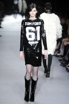 Tom Ford Autunno/Inverno 2014: look 61 della sfilata, miniabito nero con paillettes “MOLLY 61” – Archivio IT 38