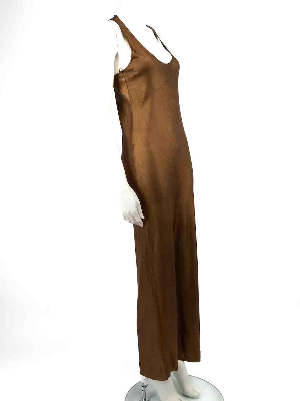CONDITION is Very good. Minimal wear to dress is evident. One small mark to front waist of dress on this used Tom Ford designer resale item.
 
 
 
 Details
 
 
 Gold
 
 Viscose
 
 Dress
 
 Metallic coating
 
 Maxi
 
 Sleeveless
 
 Scoop neck
 
 
 
