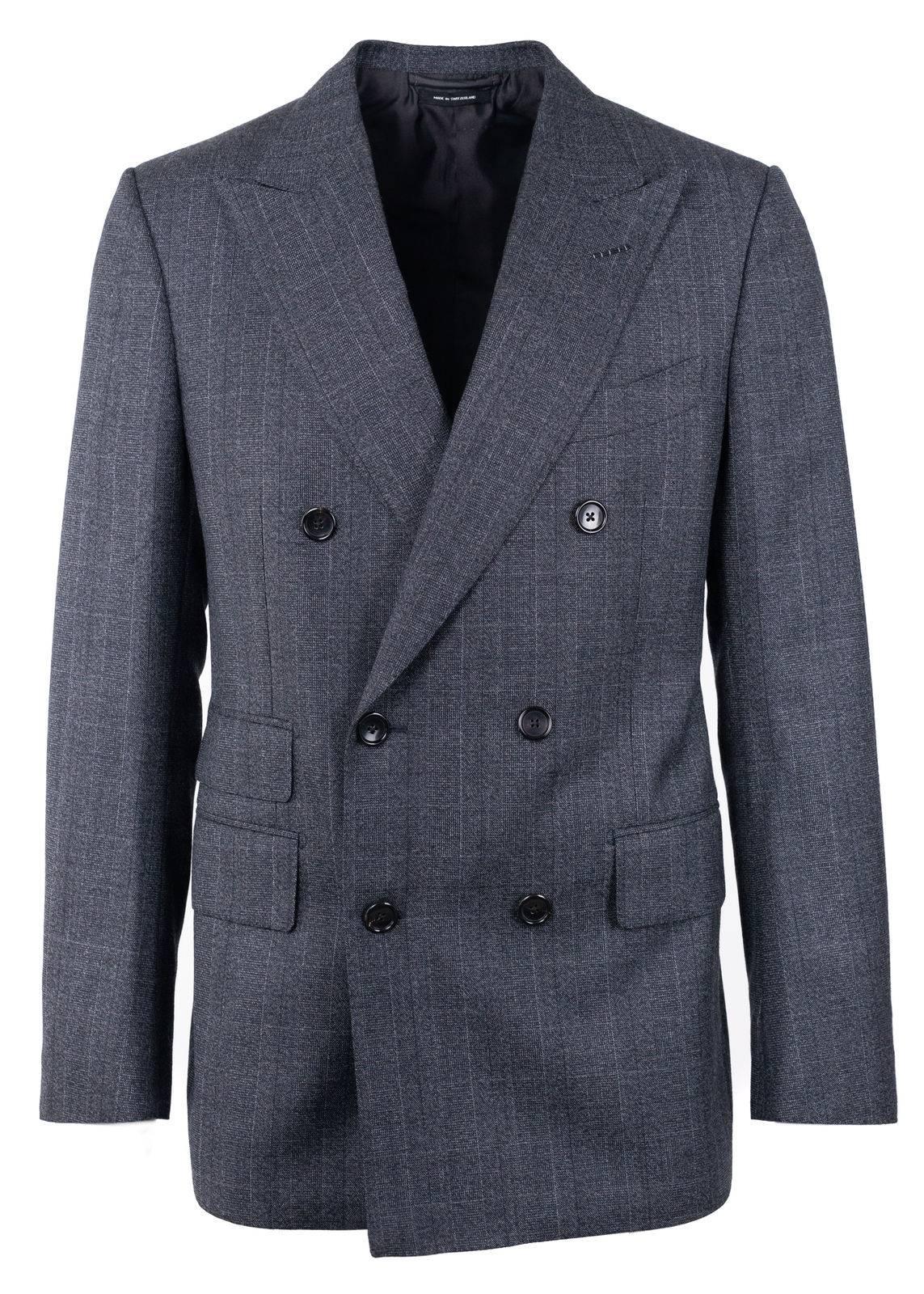 Add to your days decorum in your Tom Ford Shelton suit. This classic two piece features a irregular canvas texture, baste stitched shoulder line, and double breasted jacket. You can pair this suit with a stark white button down for nostalgic