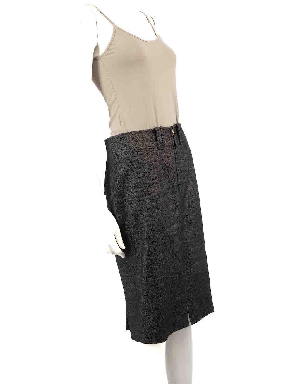 CONDITION is Very good. Hardly any visible wear to skirt is evident on this used Tom Ford designer resale item.
 
 
 
 Details
 
 
 Grey
 
 Wool
 
 Pencil skirt
 
 Knee length
 
 Front zip fastening
 
 2x Back pockets
 
 
 
 
 
 Made in Italy
 
 
 
