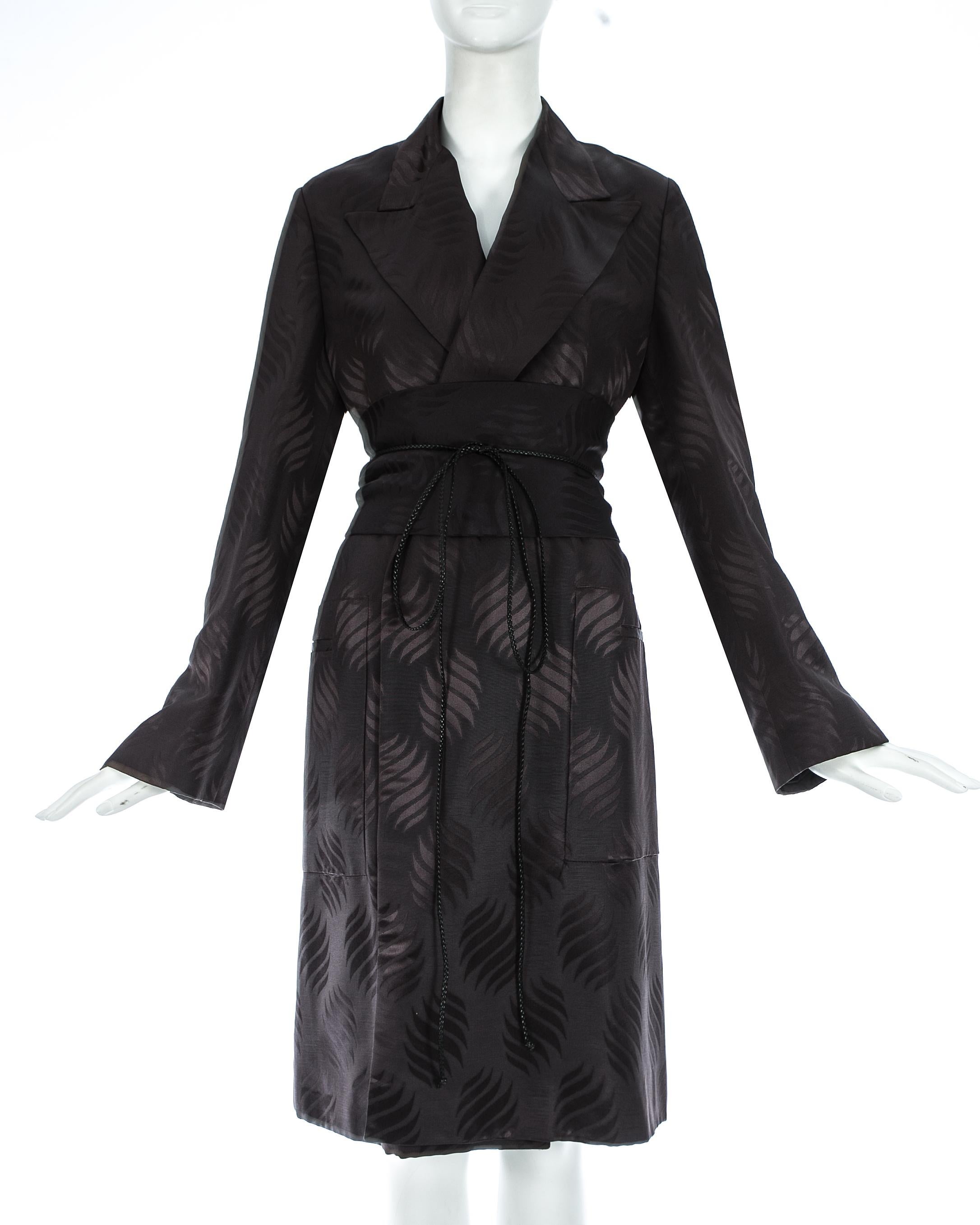 Loose fit evening robe in black silk brocade with matching Obi belt with braided leather string fastening

Autumn-Winter 2002