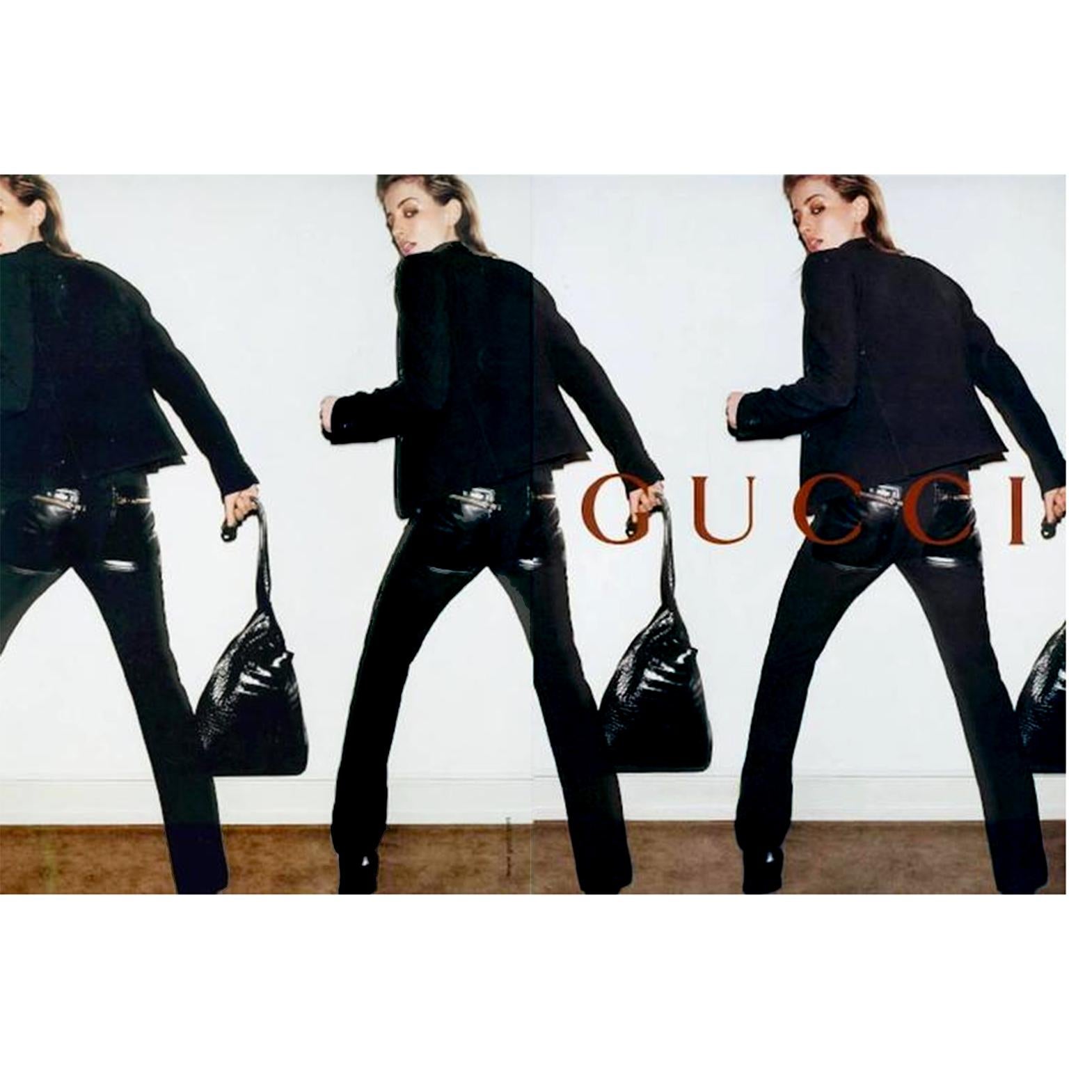 These fabulous Tom Ford For Gucci FW 2001 black wool pants have leather trim and multiple zippers! These were featured in the major Gucci ad campaign in 2001 and on the Gucci runway that year. These iconic pants and were a very important part of the