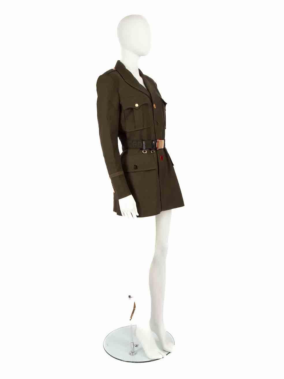 CONDITION is Never worn. No visible wear to coat is evident on this new Tom Ford designer resale item.
 
Details
Khaki
Wool
Military style coat
Mid length
Single breasted
4x Front buttoned flap pockets
Buttoned cuffs
Logo branded belt
2x Internal