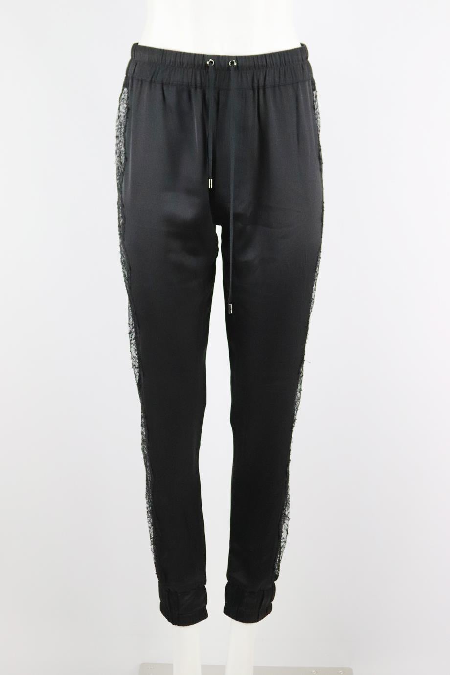 Tom Ford lace trimmed silk tapered pants. Black. Pull on. 100% Silk; fabric2: 53% viscose, 47% polyamide. Size: IT 38 (UK 6, US 2, FR 34). Waist: 28 in. Hips: 40 in. Length: 39 in. Inseam: 28.5 in. Rise: 13.6 in. Very good condition - No sign of